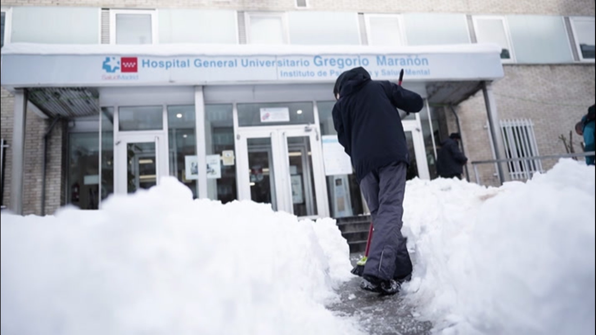 Residents of Madrid, Spain, cleared the entrances to hospitals on Jan. 10, after Storm Filomena dropped several inches of snow on the city.