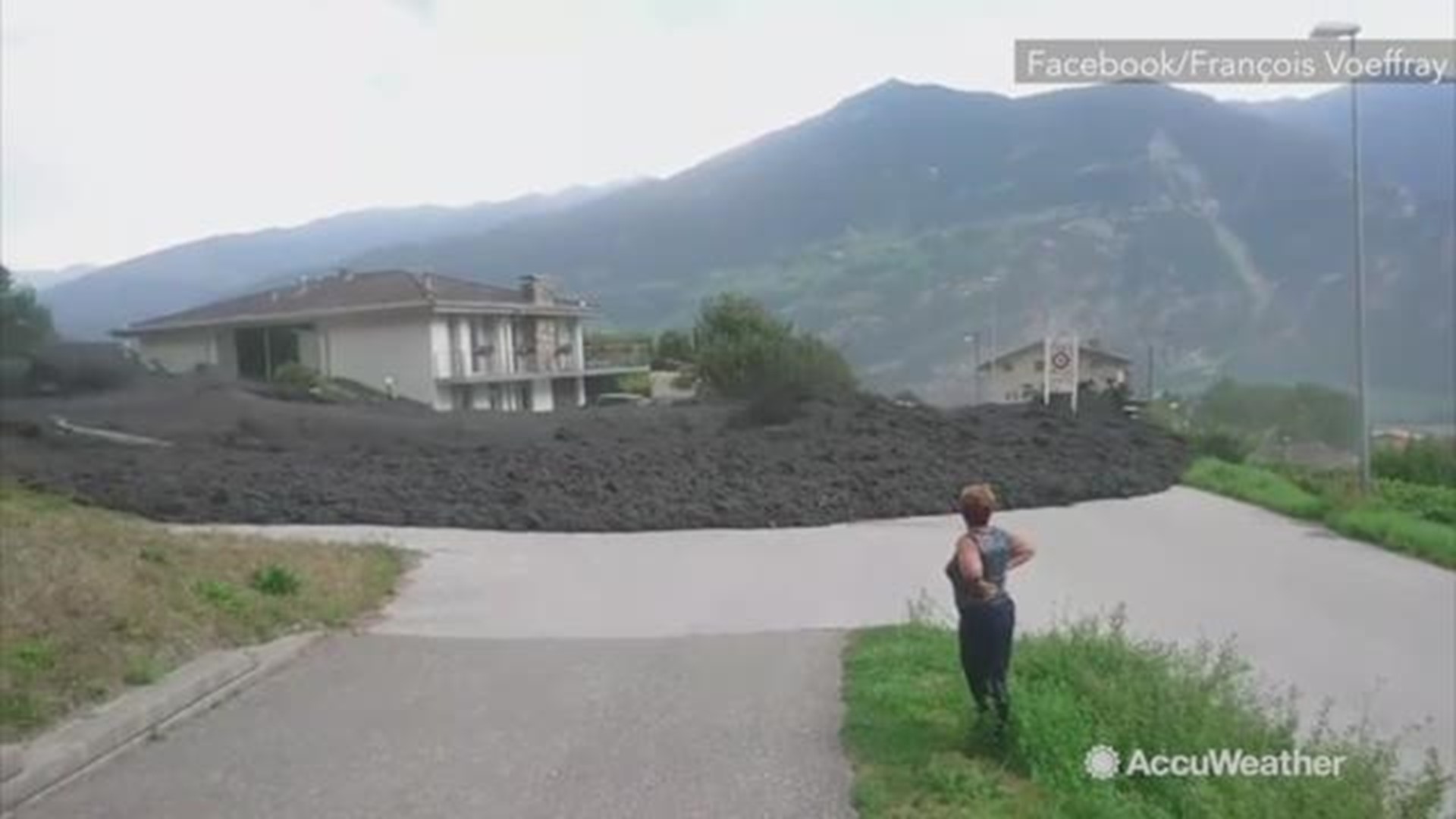 Dramatic footage shows a huge mud flow hit Chamoson, Switzerland on August 7. 