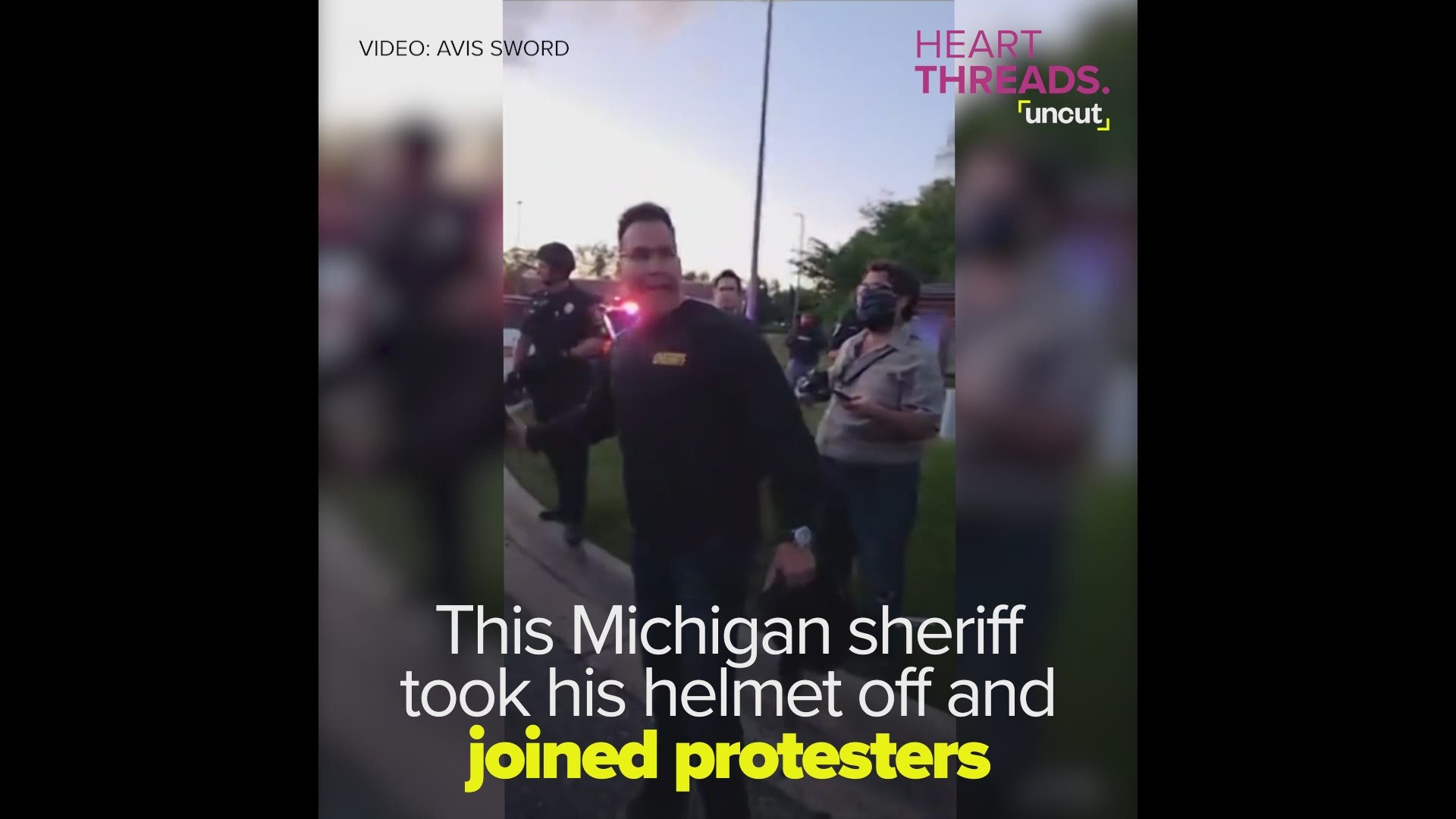 Sheriff Chris Swanson joined demonstrators at a protest demanding justice for the death of George Floyd, who died after being pinned down by a police officer.