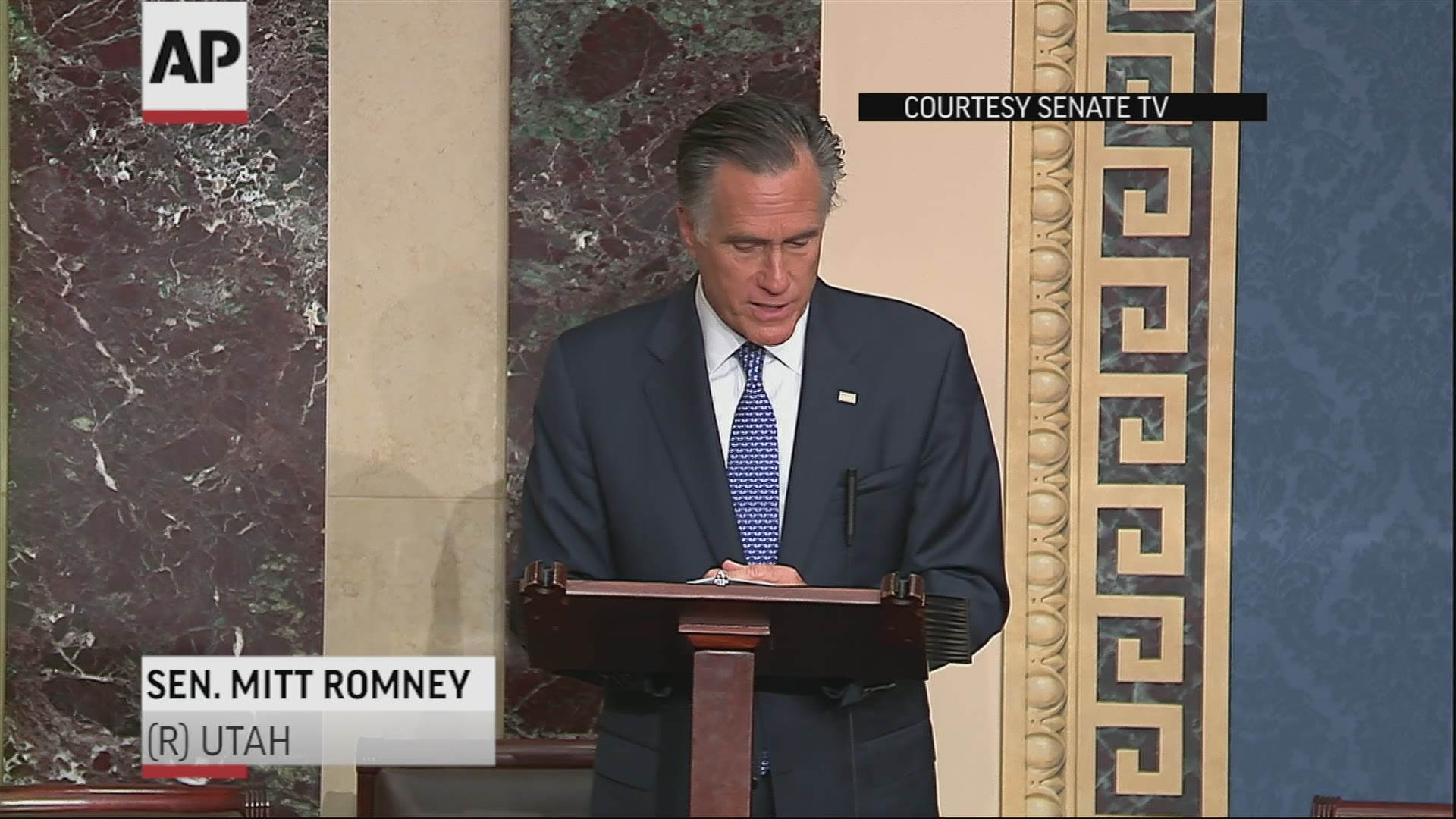 Sen. Mitt Romney of Utah announced on the Senate floor that he was breaking with his party. Romney appeared to choke up as he spoke.
