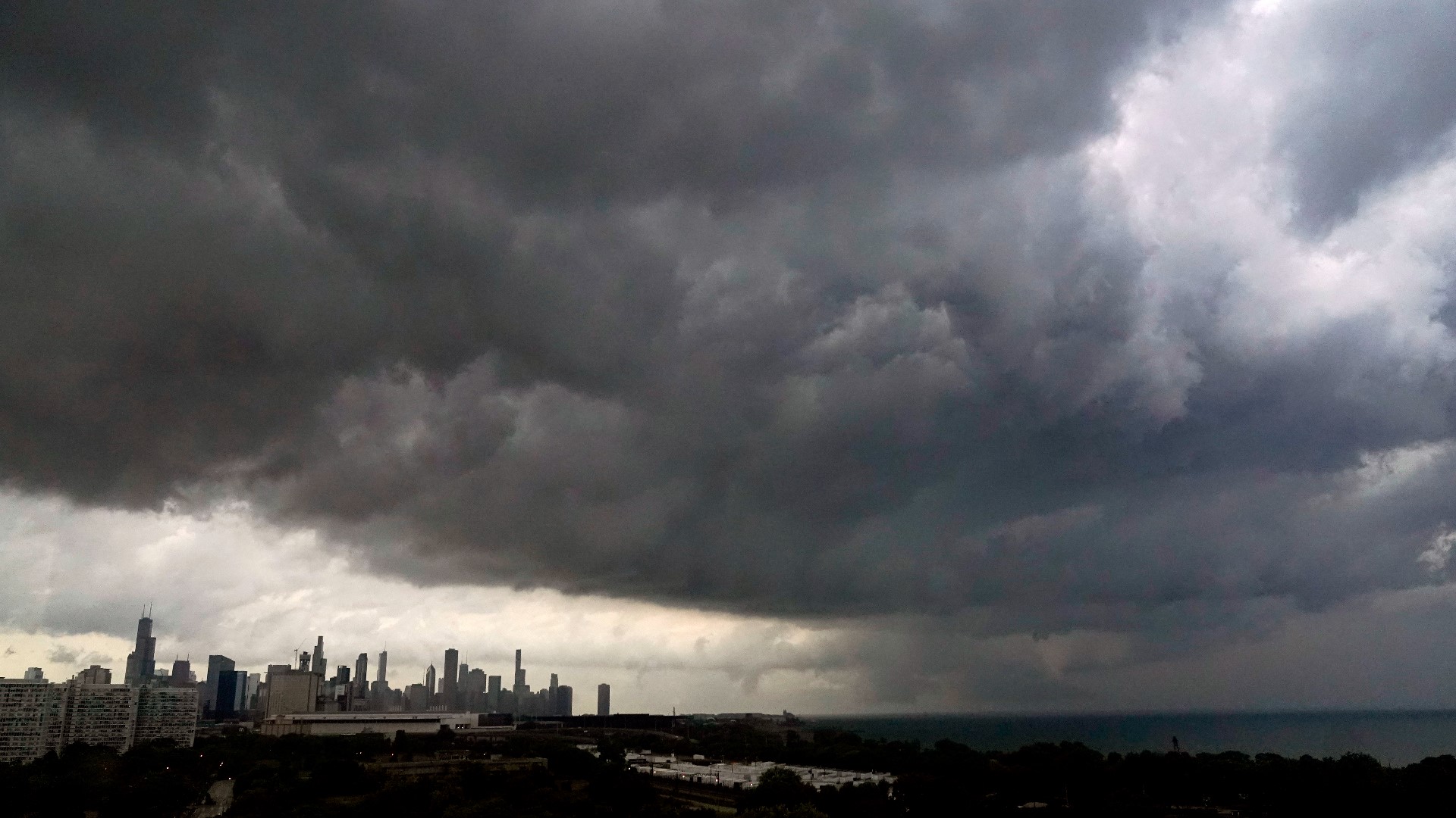 A tornado touched down on Wednesday evening near Chicago’s O’Hare International Airport, prompting passengers to take shelter and disrupting hundreds of flights.