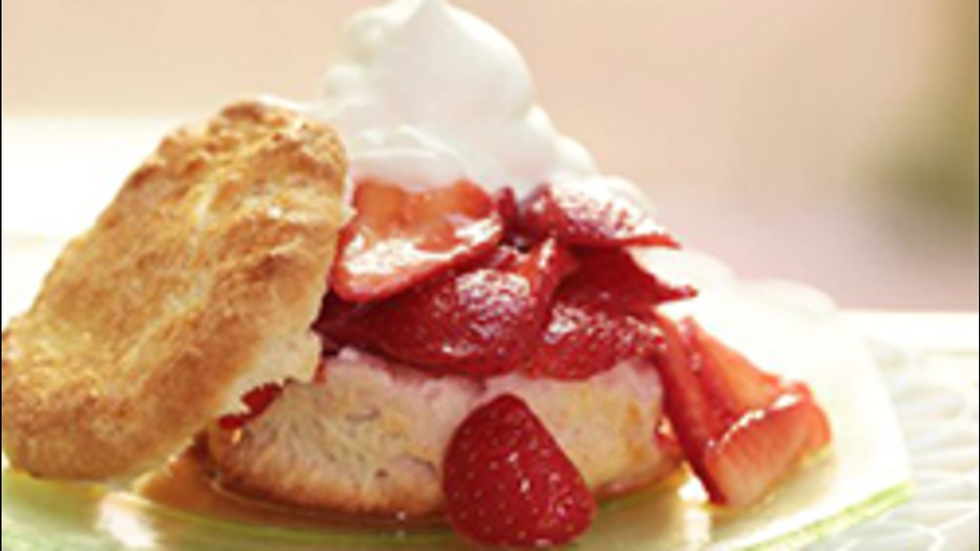This strawberry shortcake with homemade biscuits recipe is out of this world! The combination of sweet, tangy strawberries...smooth, creamy whipped cream...and light, fluffy biscuits is simply irresistible!