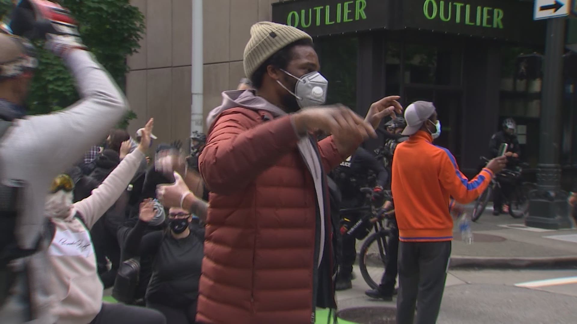 About 10,000 people took to the streets of Seattle on Saturday in protest, causing concern for health experts that coronavirus could spread.