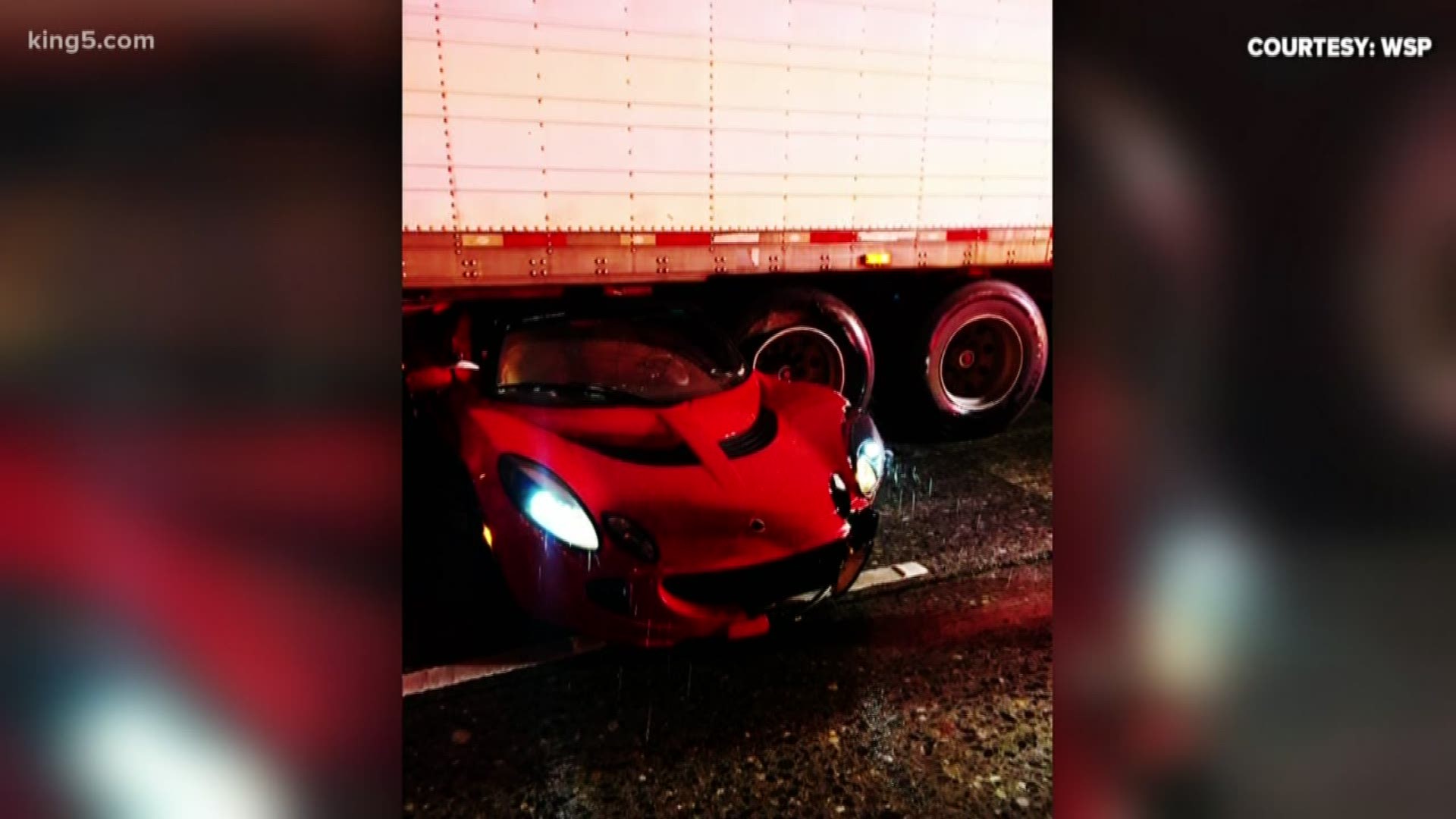 It was a very close call for the driver of a Lotus sports car when it hydroplaned under a semi-truck. Luckily, no one was hurt.