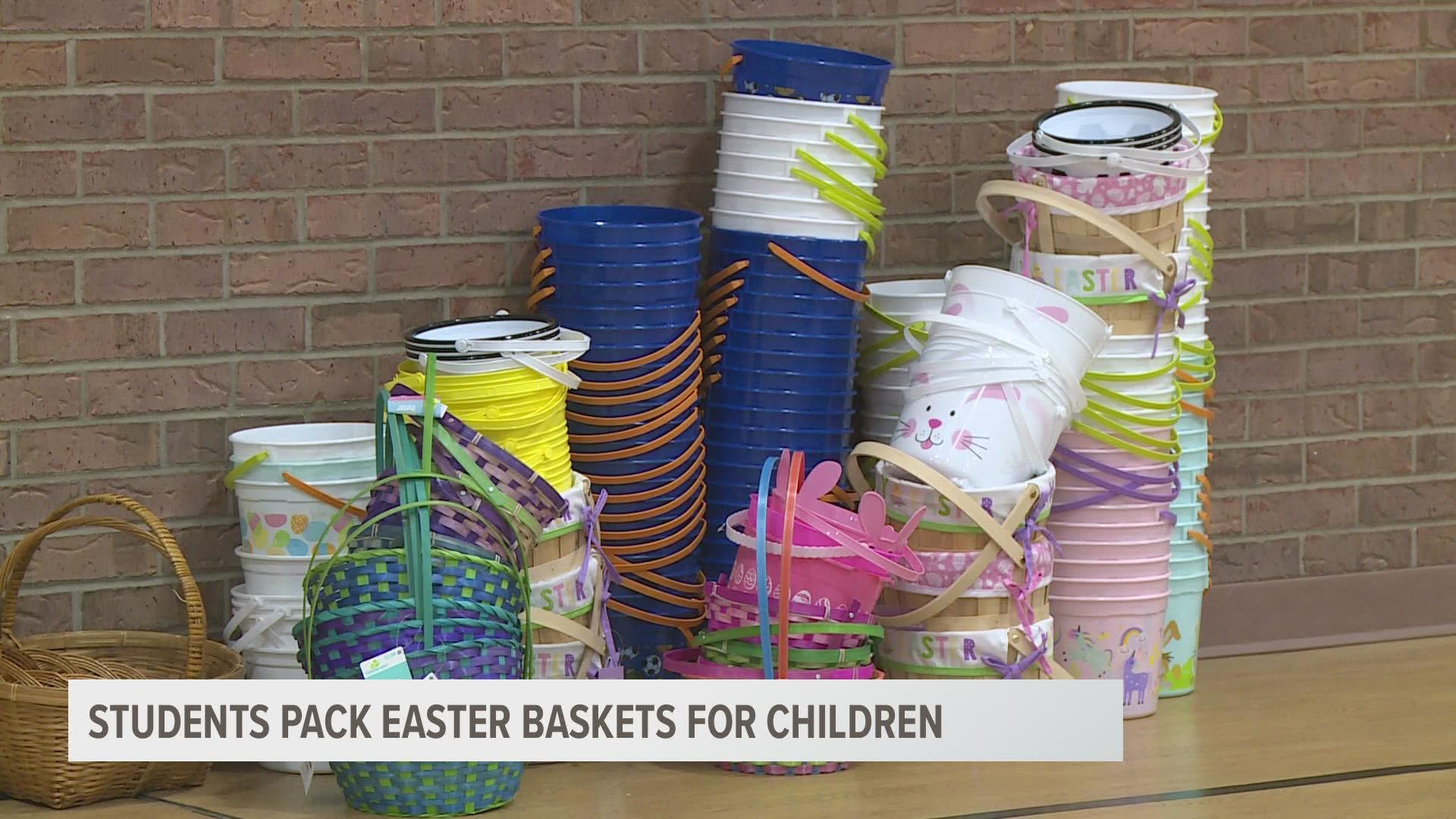 Making Easter baskets for children who might not normally get them is an annual tradition for St. Paul the Apostle School.
