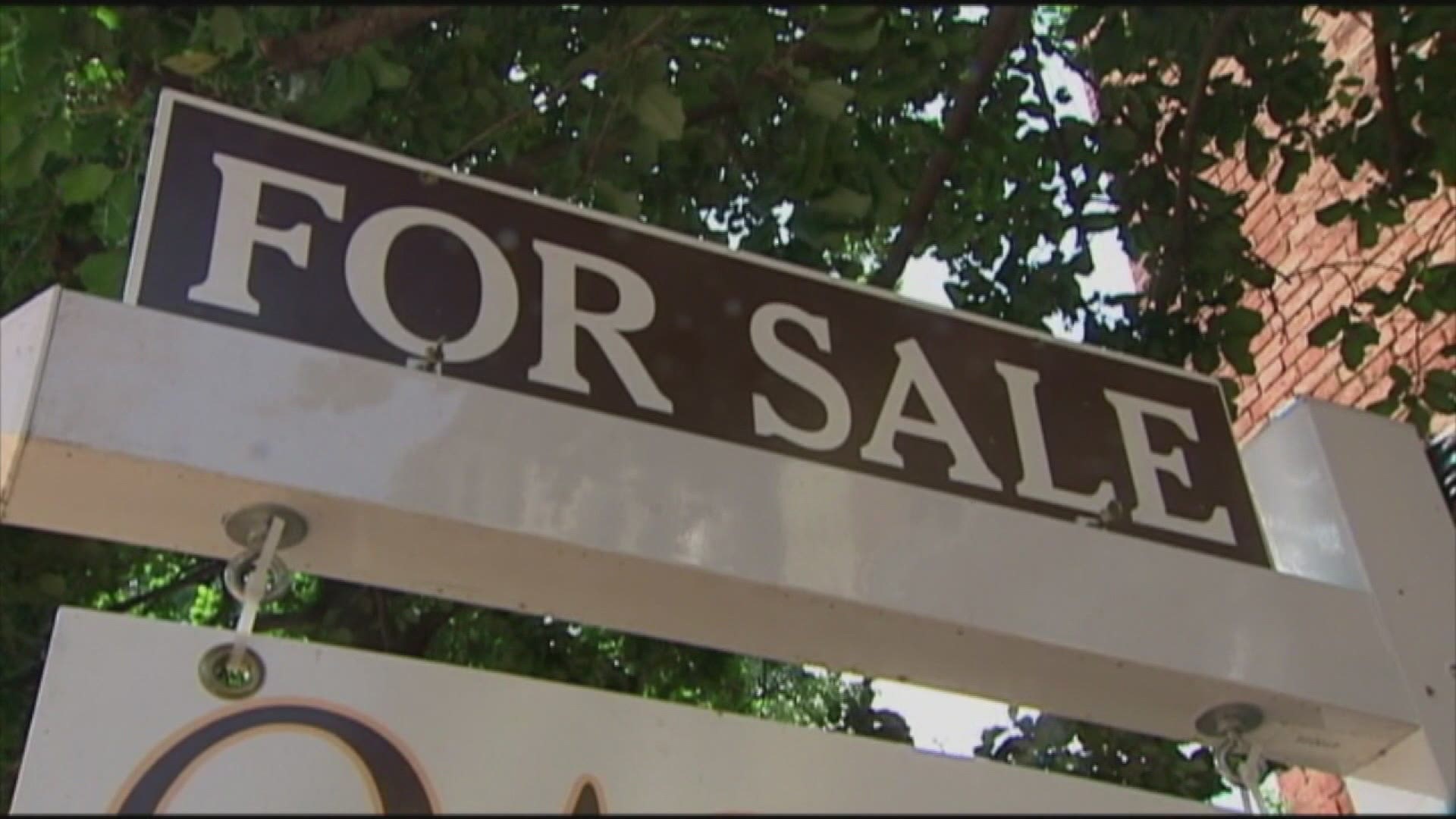 Local experts say the housing market in the Greater Grand Rapids area is showing signs of slowing but it's far from a return to normal.