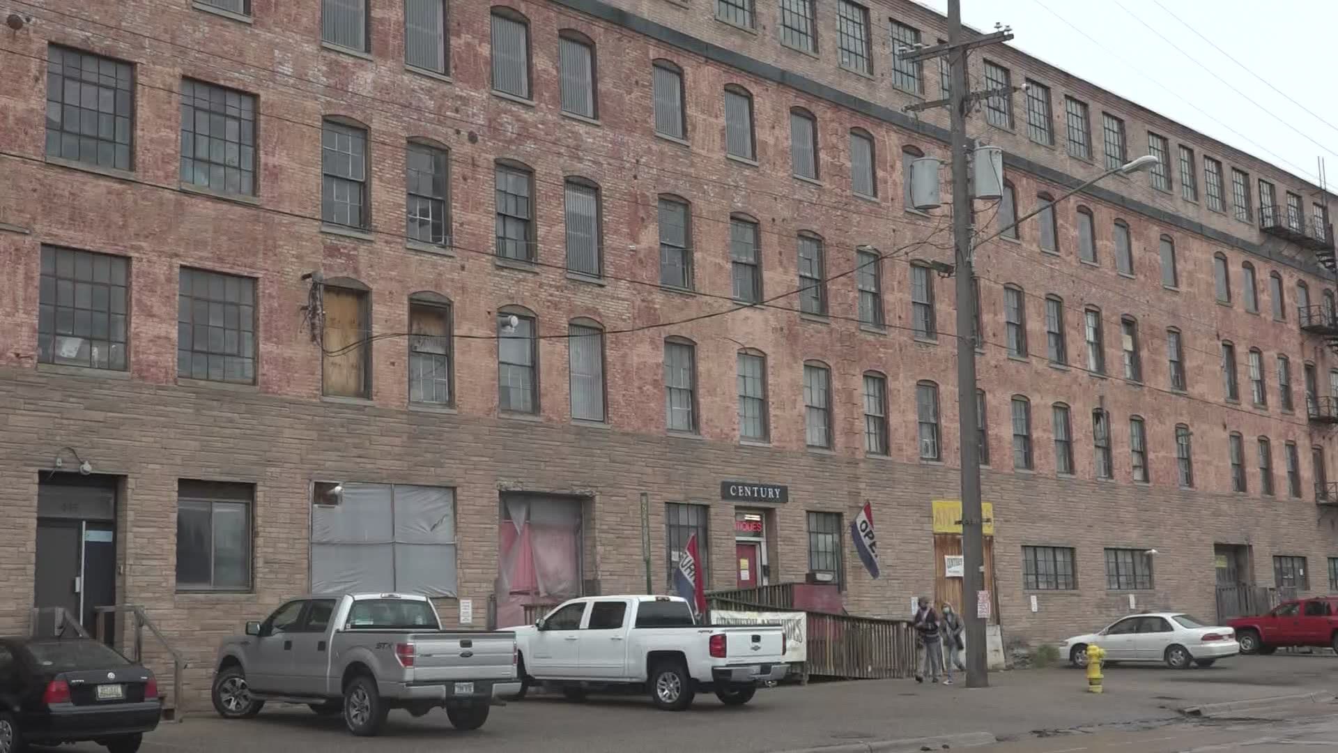 Antique store owners are worry their businesses could be in jeopardy, after the city of Grand Rapids approved plans to build a six story building near the site
