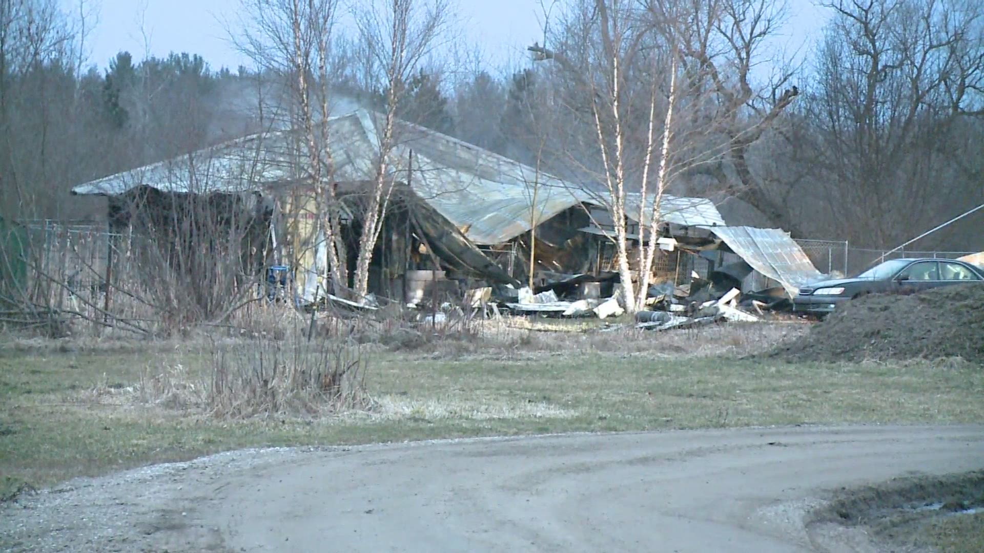 As many as 30 dogs feared dead in Muskegon County kennel fire - raw footage of damage.