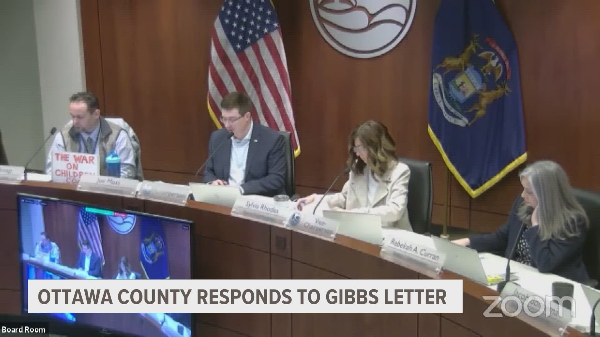 Despite not occupying a chair, Gibbs was the center of attention at the Ottawa County Board of Commissioners meeting.