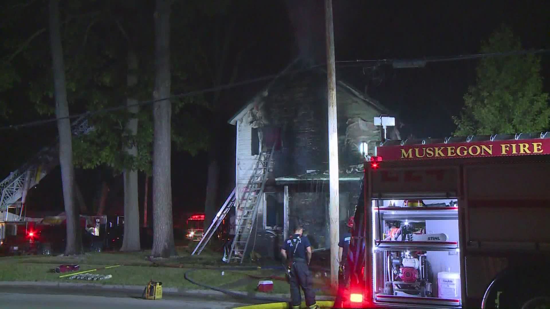 Crews battle house fire in Muskegon