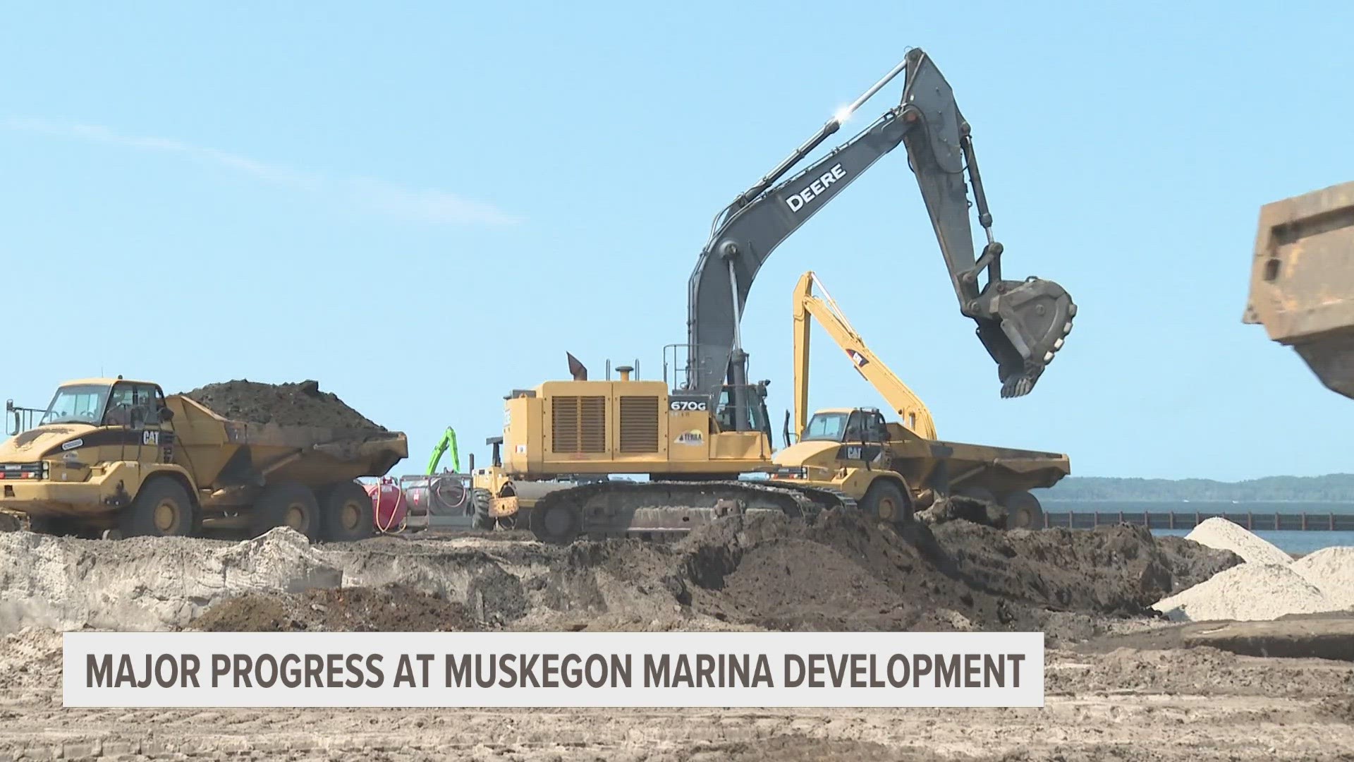 Developer Ryan Leestma says work on the docks here will likely continue through the spring, with sections getting trucked in daily.