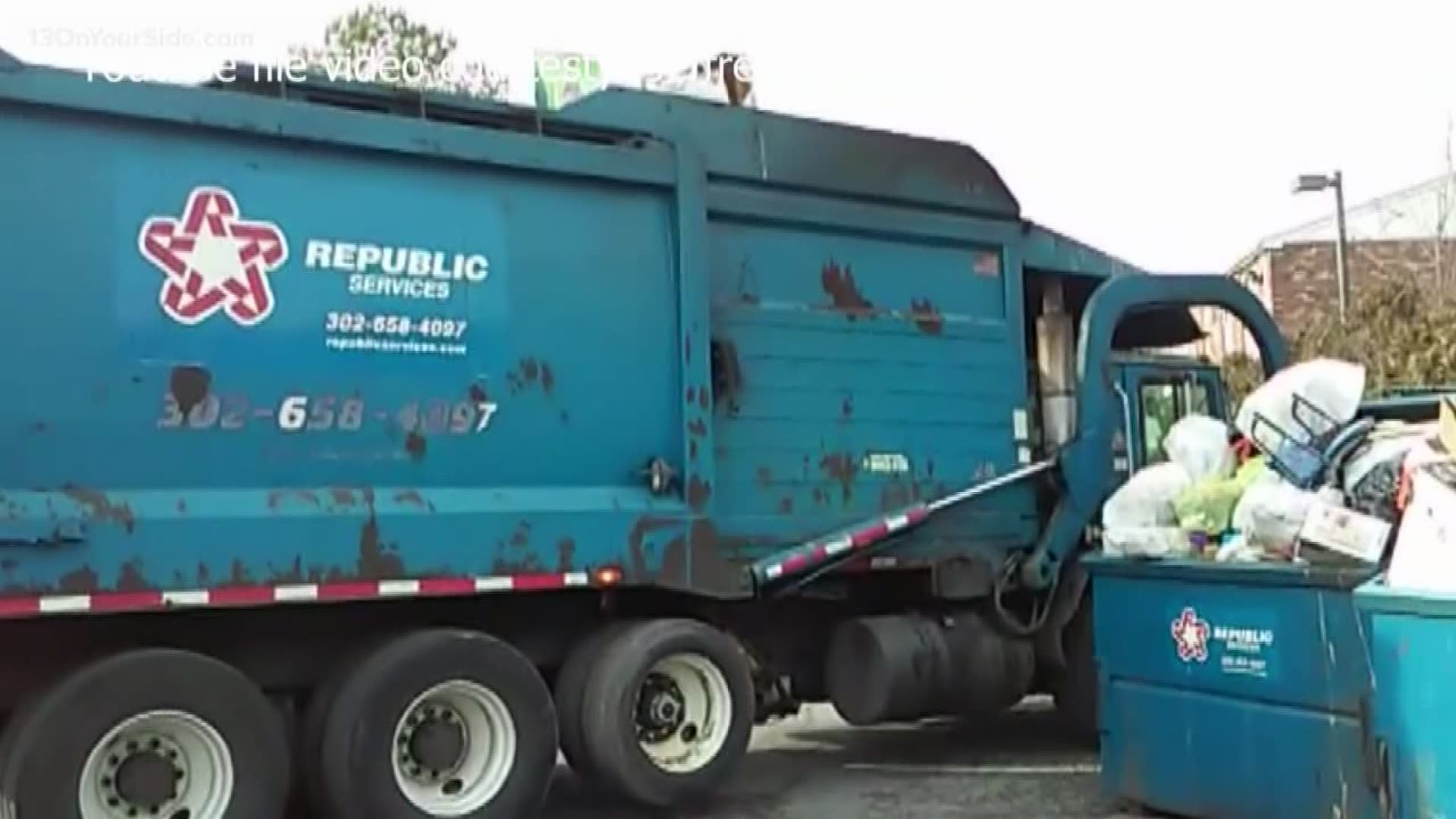 Technical rescue team in Kalamazoo save man trapped in garbage truck