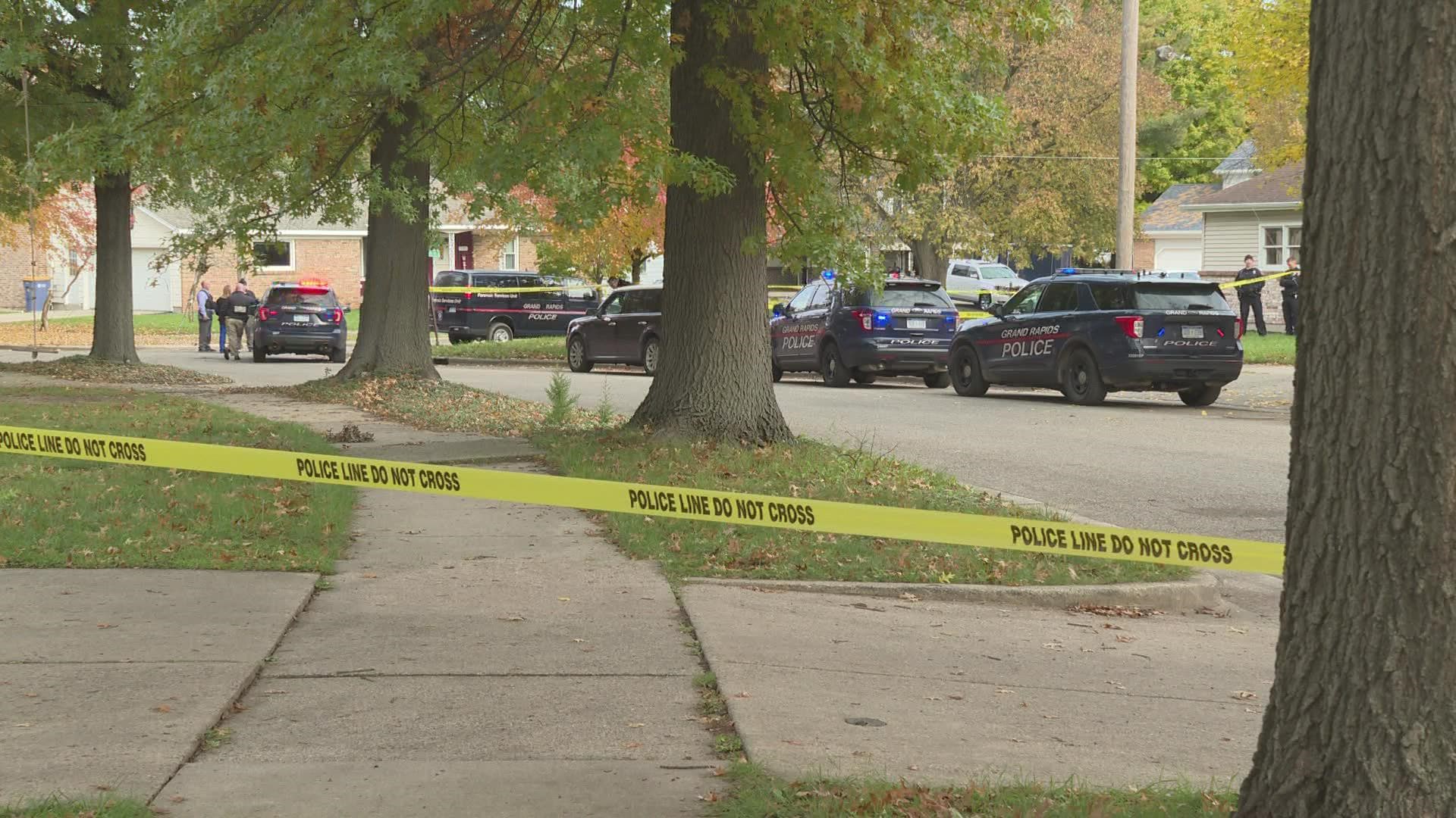 Two adults and one baby are dead after being found unresponsive in a car on Grand Rapids’ south side.