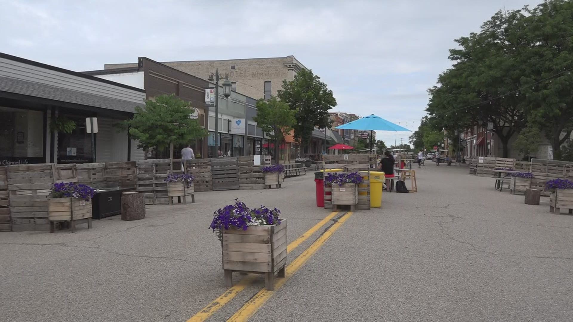 The refreshment area was beneficial to downtown businesses, but fewer people are visiting this summer, city officials said. The plan is to bring it back in the fall.