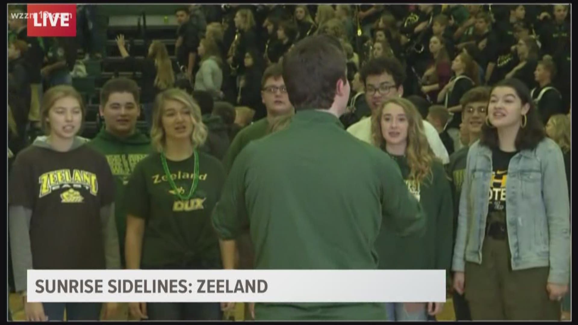 Sunrise Sidelines: Zeeland choirs sing national anthem