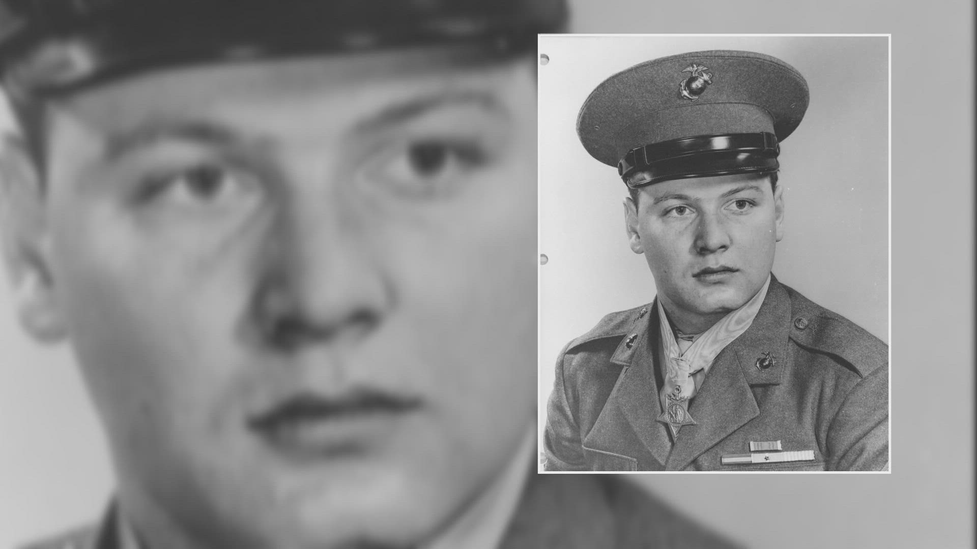 Duane E. Dewey was wounded by a grenade when a second grenade landed by him. He scooped it, put it under his hip and absorbed the blast, saving many soldier's lives.