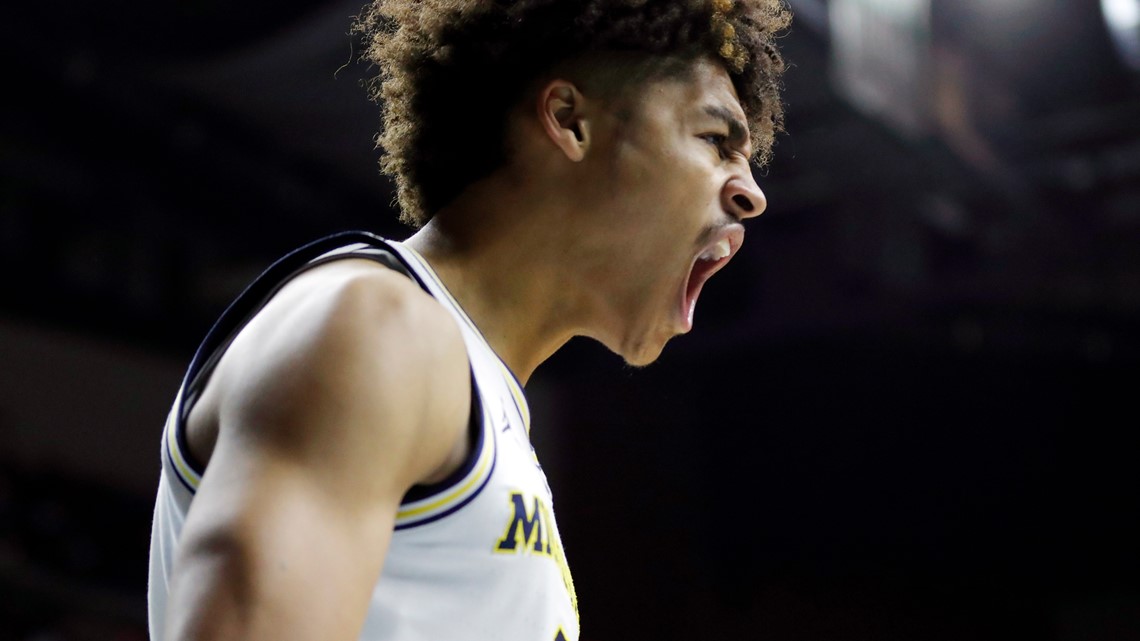 Michigan's Jordan Poole is keeping his name in the NBA draft