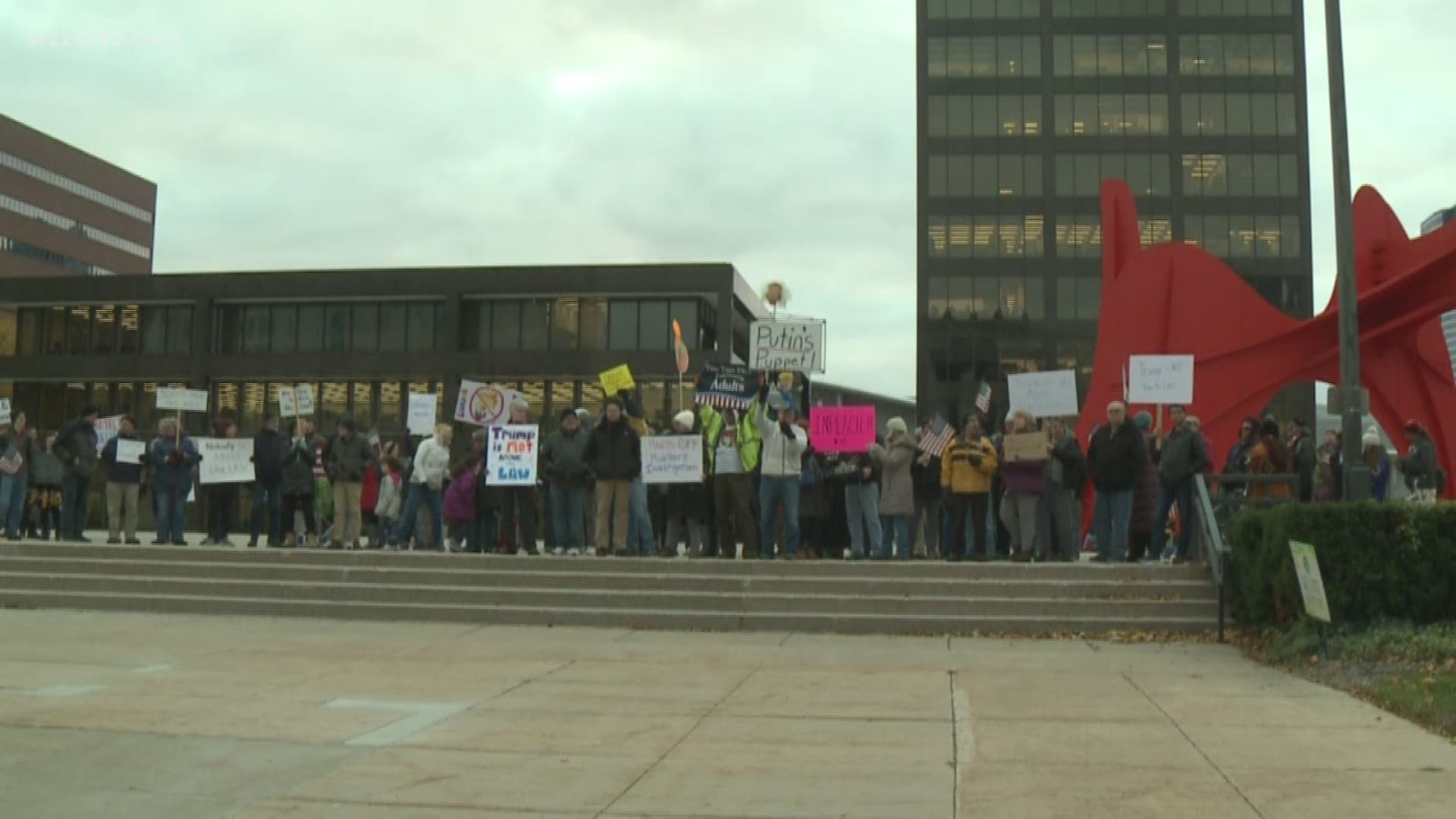 No one is above the law protest in Grand Rapids