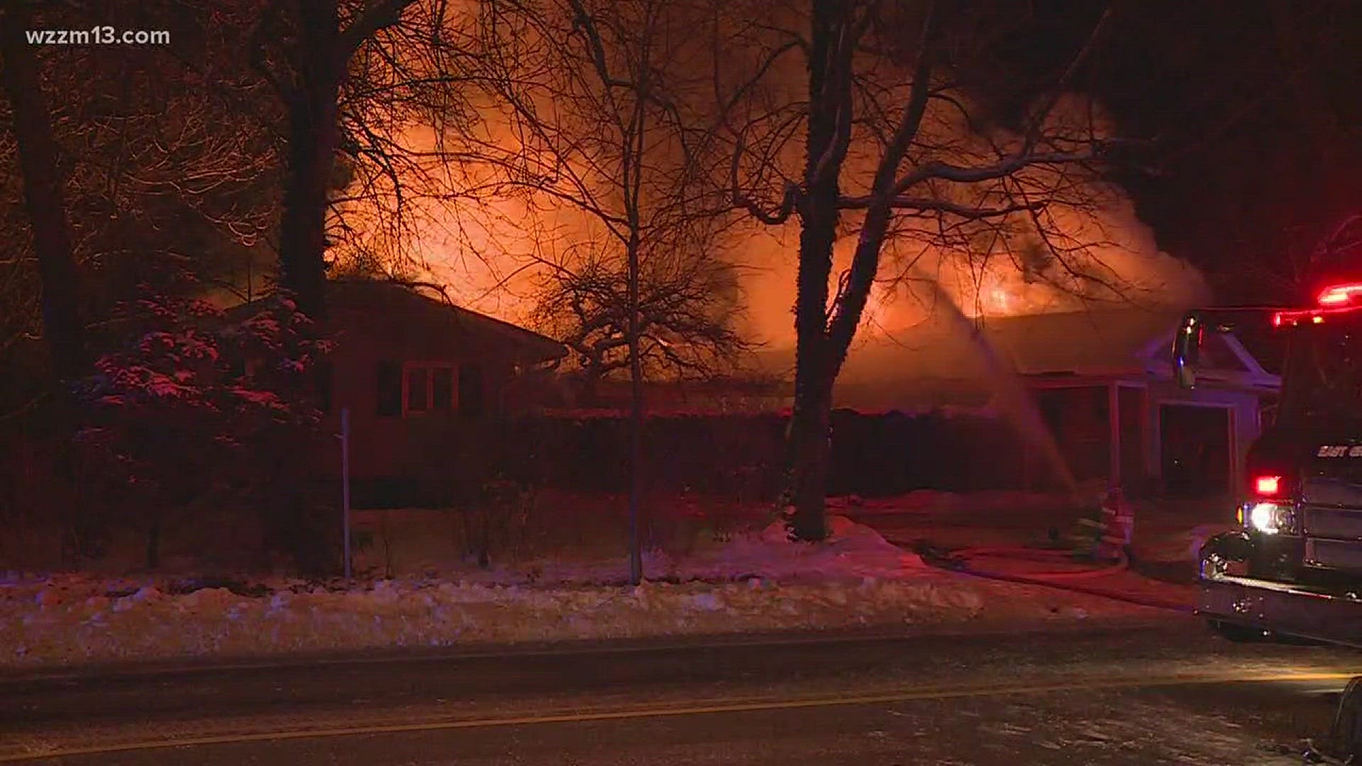 Heavy flames destroy East Grand Rapids home