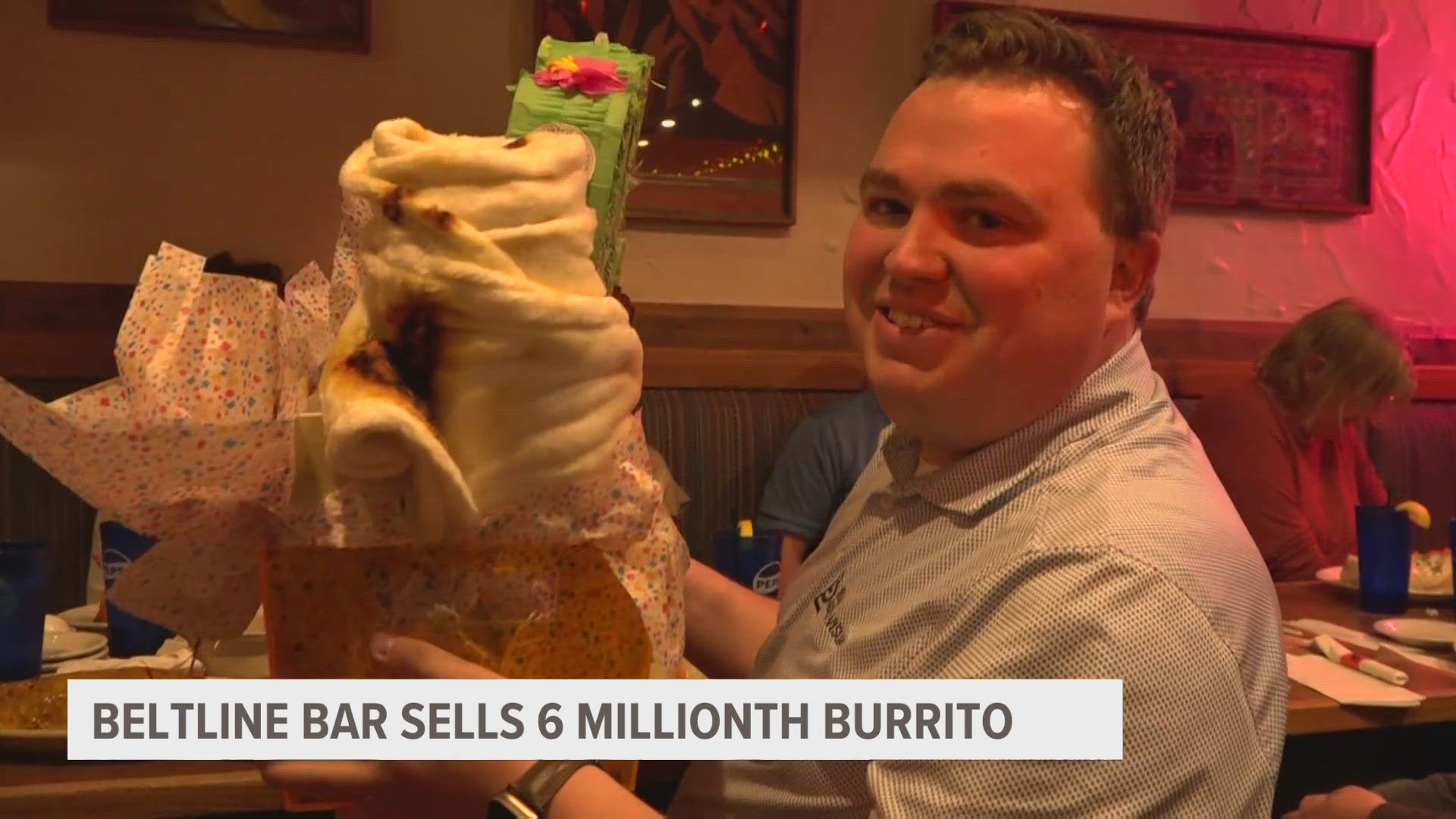 Today at the Beltline Bar, history and hot sauce went hand-in-hand with the sale of their six millionth wet burrito.