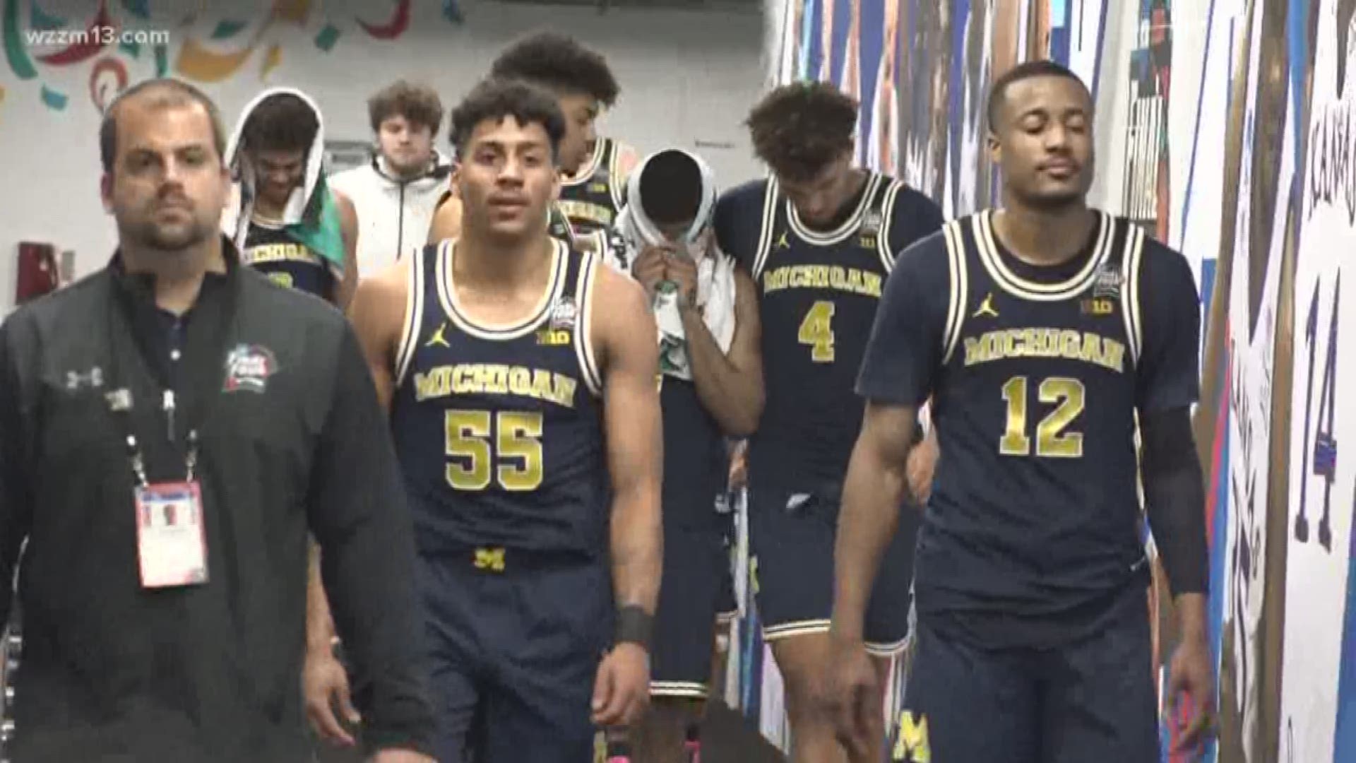 Michigan returns from NCAA title game