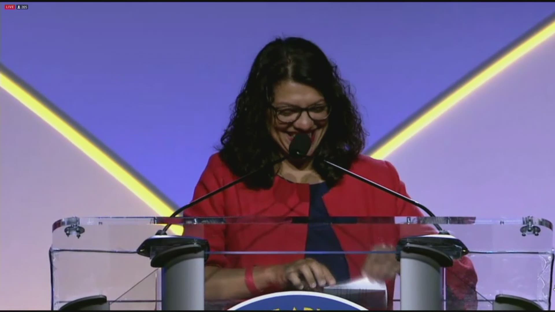 Rep. Rashida Tlaib (D-Detroit) opened her speech at the NAACP convention Monday morning, July 22, 2019 with a jab at the president.