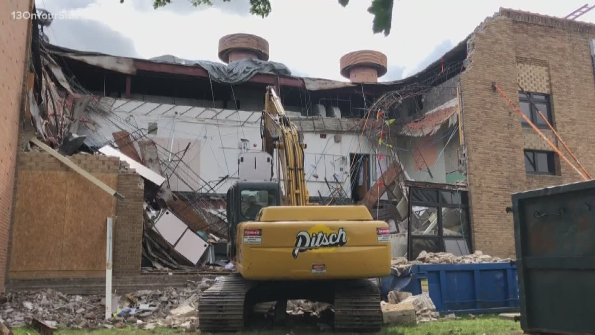 Another portion of Lee Middle & High School collapsed over the weekend. Work continued early Monday morning to remove debris and demolish what was damaged for future renovation.