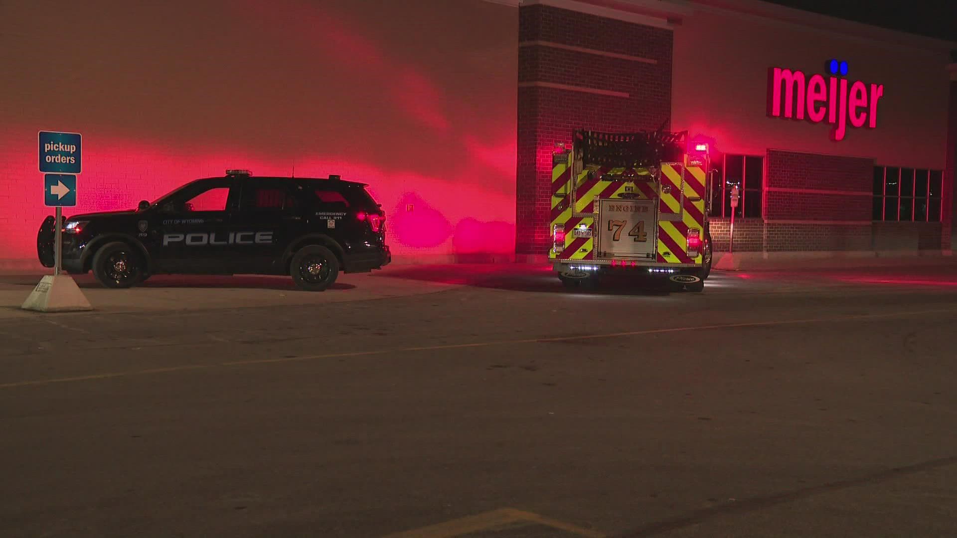 Authorities say a man who is currently homeless stabbed two men "at random" inside a Wyoming Meijer store Monday evening.