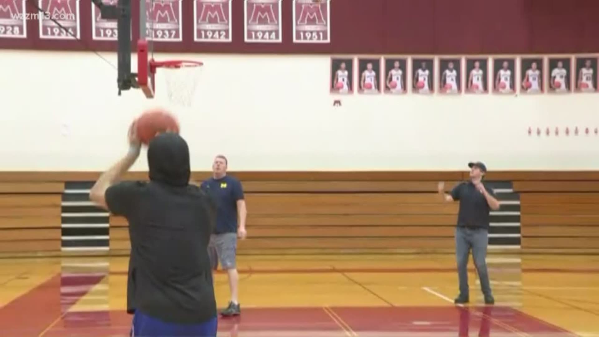 "Heroes For Kids" charity basketball game at Muskegon High School aims to end child abuse.