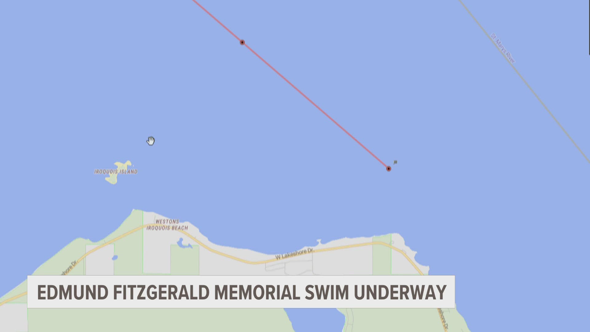 A memorial relay swim is symbolically finishing the Edmund Fitzgerald's final journey nearly 50 years after the ship sank in Lake Superior.