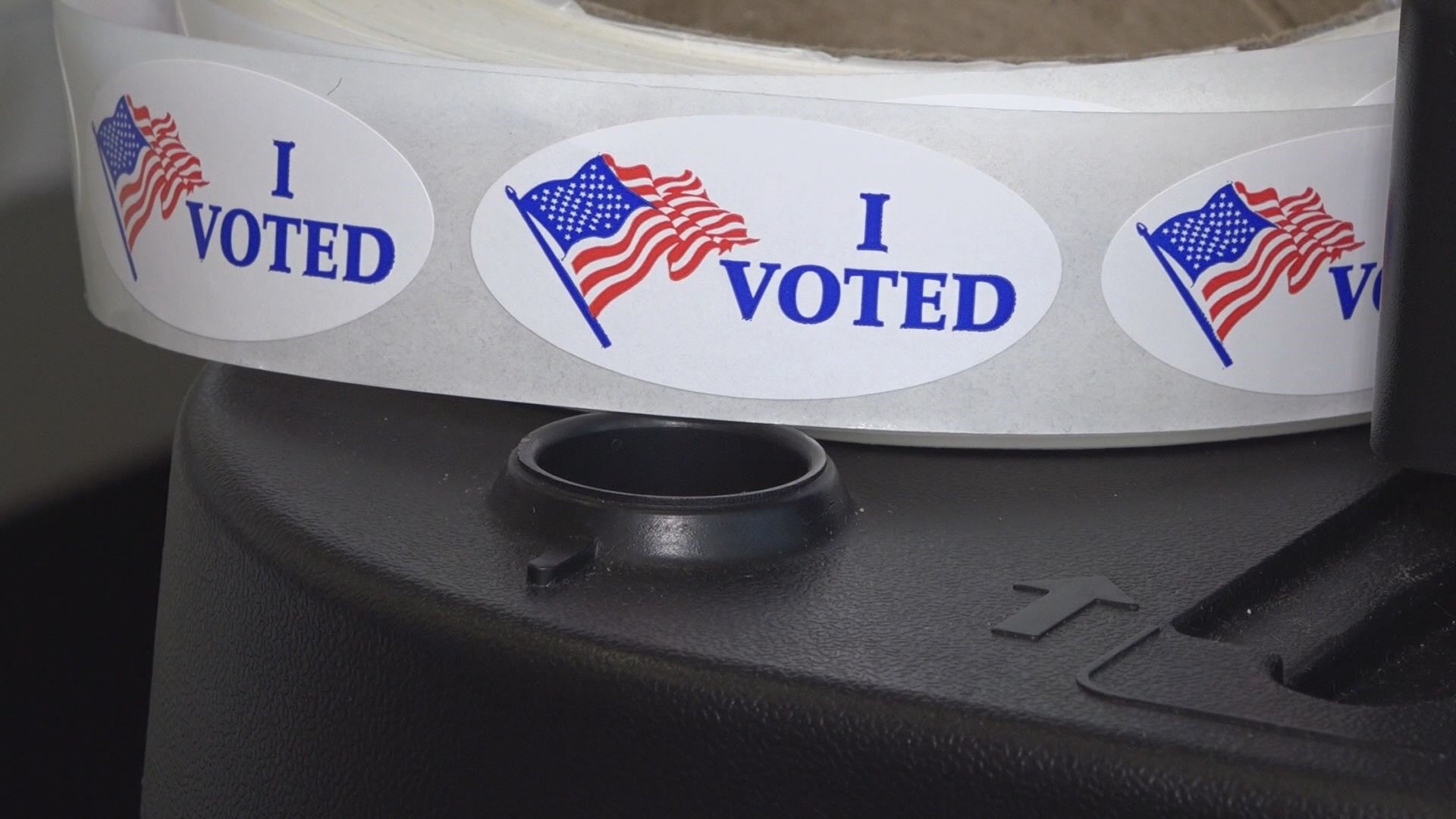 A poll worker has been charged, accused of putting a USB drive into a poll machine, potentially compromising voter information.