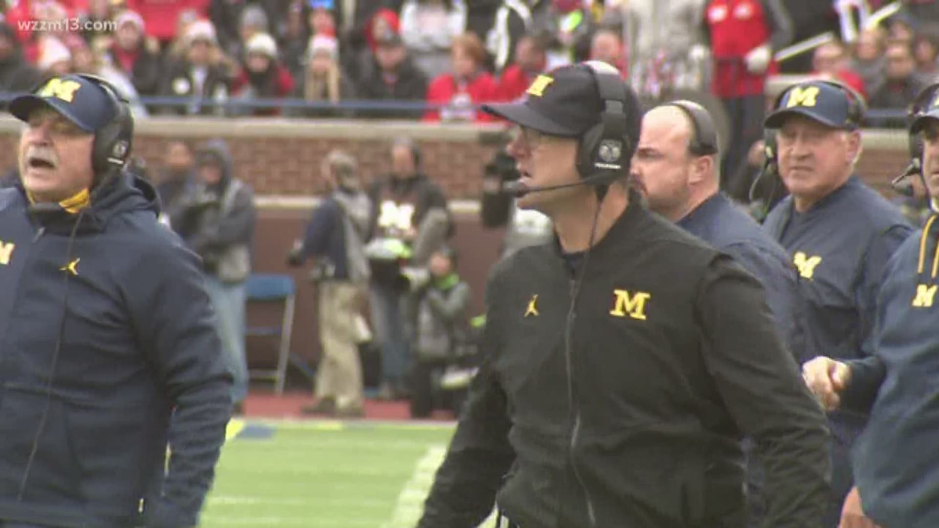 U of M police investigating former players tweets "threatening" Harbaugh