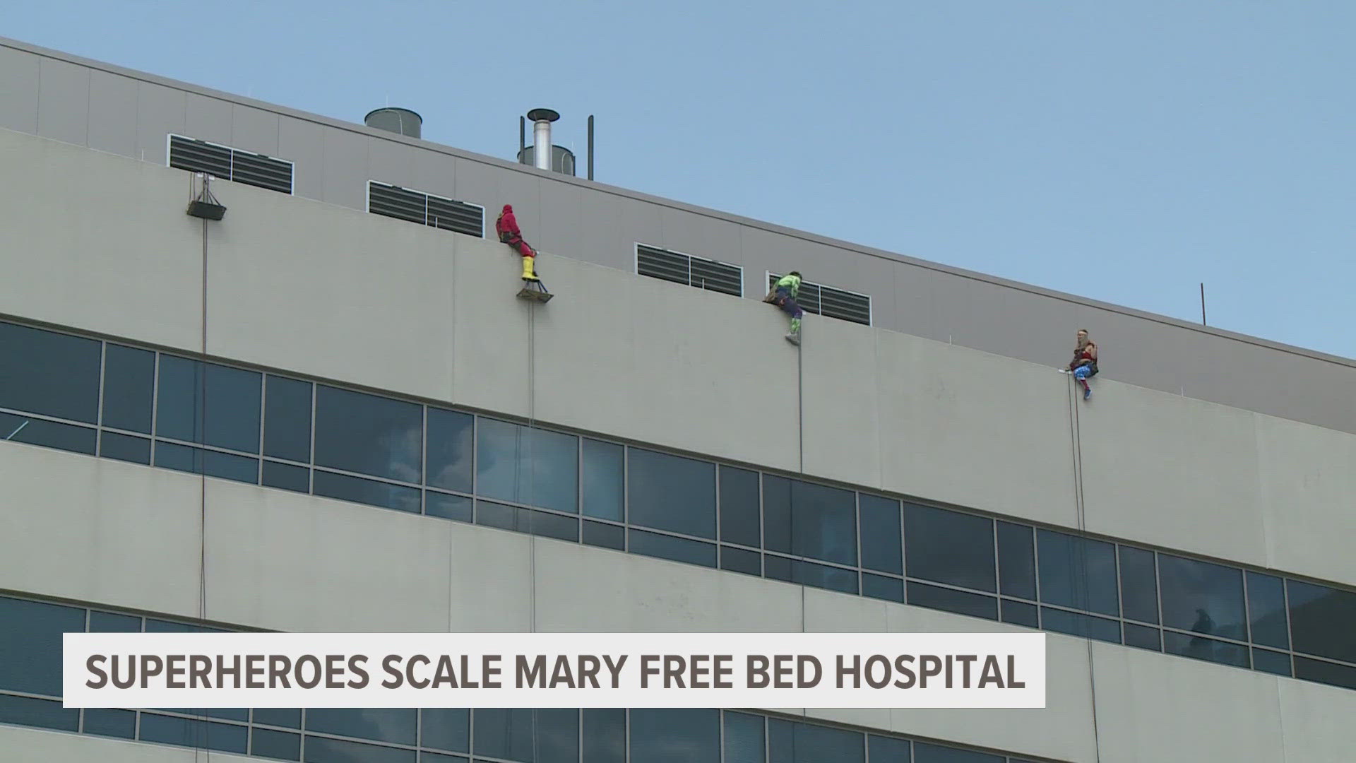 Batman, Flash, Hulk, Spiderman, Thor and Wonder Woman rappelled down the building to surprise patients.