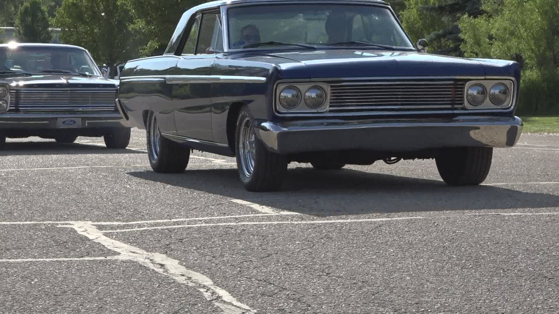 What was supposed to be a car show turned into a cruise around Hudsonville because of concerns about the virus.