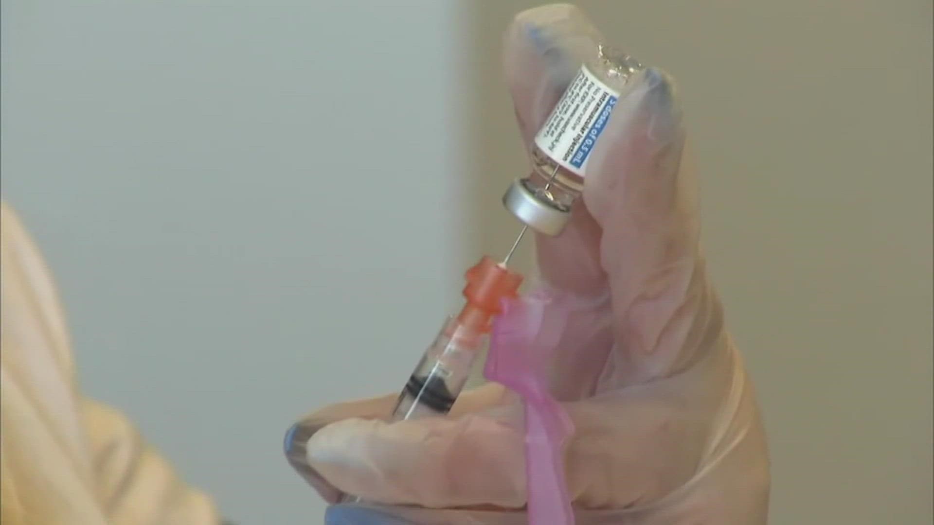 Spectrum Health Physician looks back on being one of Michigan's first to be vaccinated.