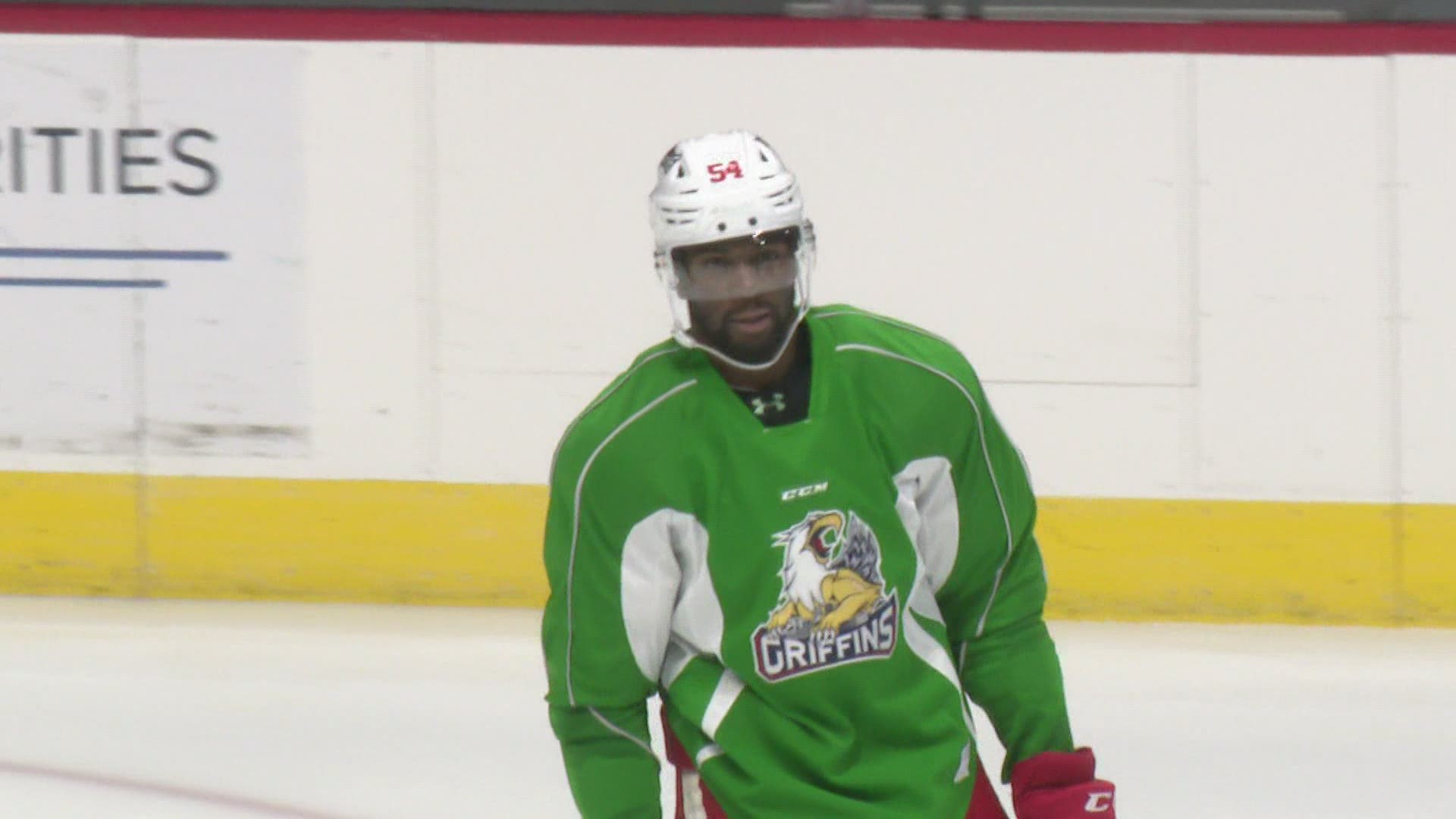 Smith's experiences with racism in hockey have motivated him to help bring change.