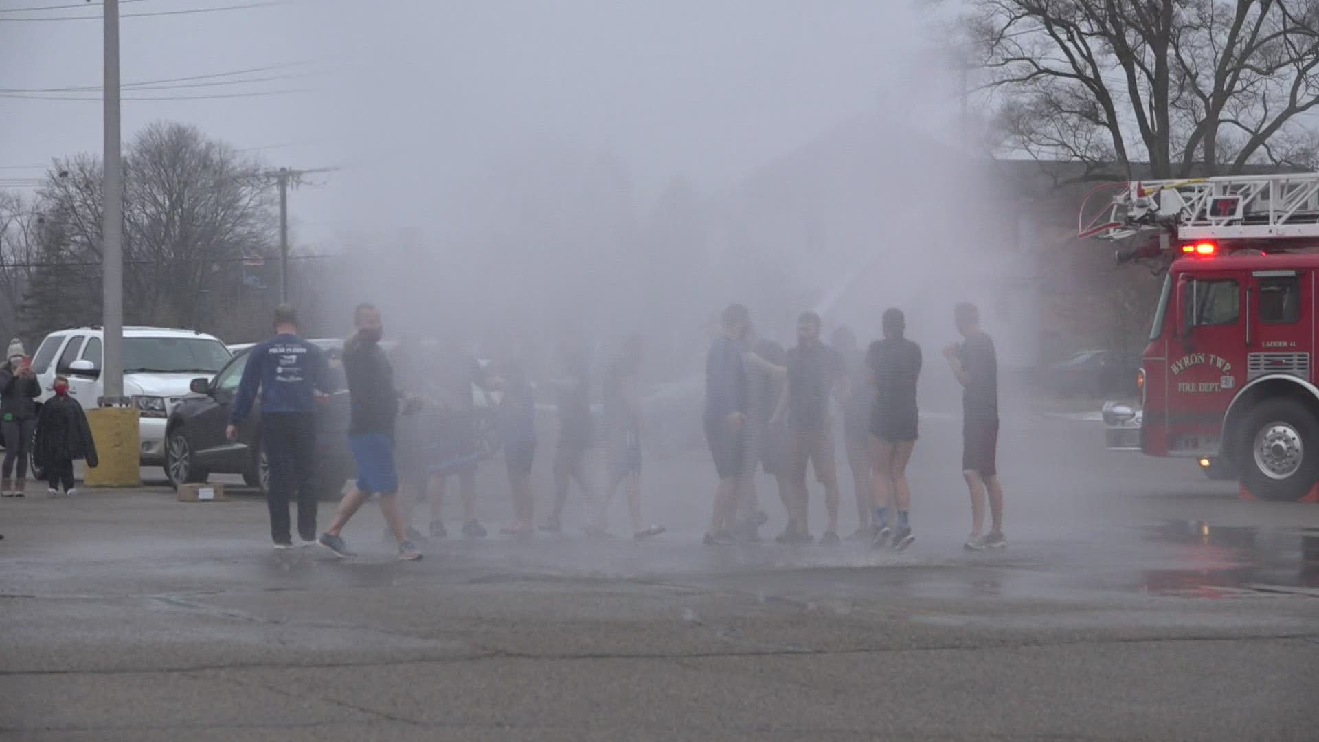 Instead of jumping into a pool, participants were “plunged” with fire hoses.