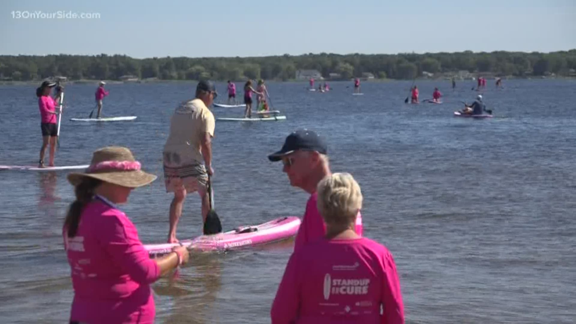 Due to high water levels at Harbour Towne Beach, organizers of the fifth annual Standup for the Cure have been forced to relocate the event to Ross Park. There will still be all the same festivities in the new location.