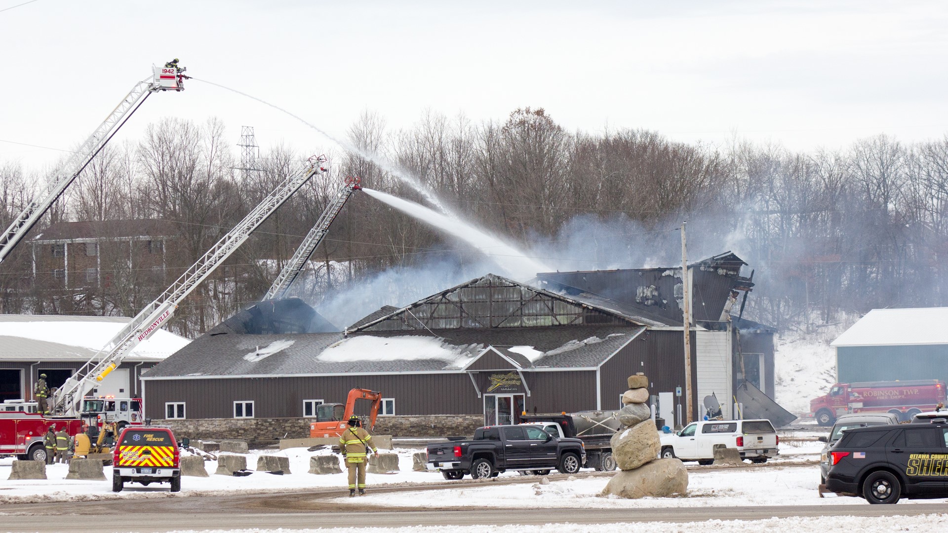 PHOTOS Multiple departments battle commercial fire in Zeeland Township