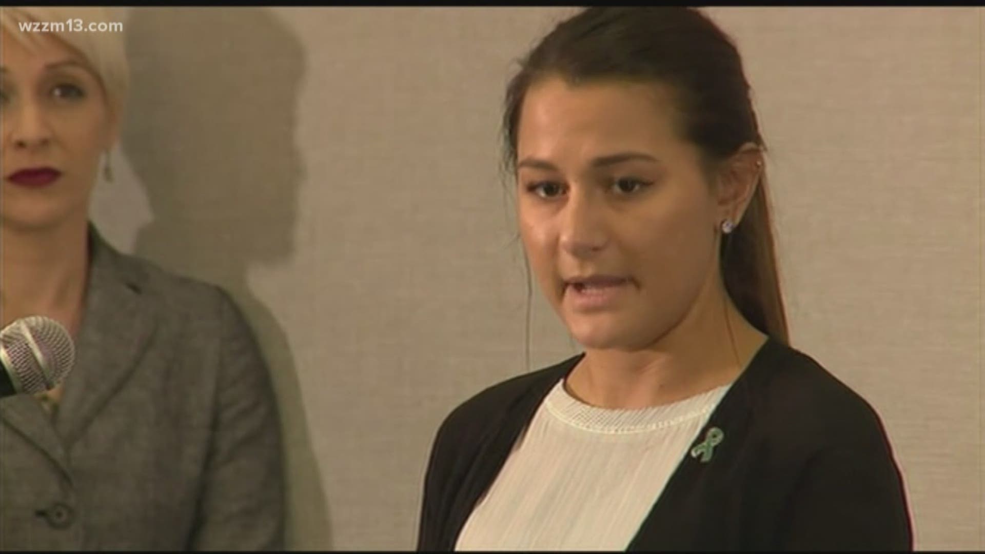 A Michigan State University student is speaking publicly a year after filing a lawsuit against the school alleging that three former men's basketball players raped her in 2015 and that she was discouraged by counseling center staff from reporting what happened.