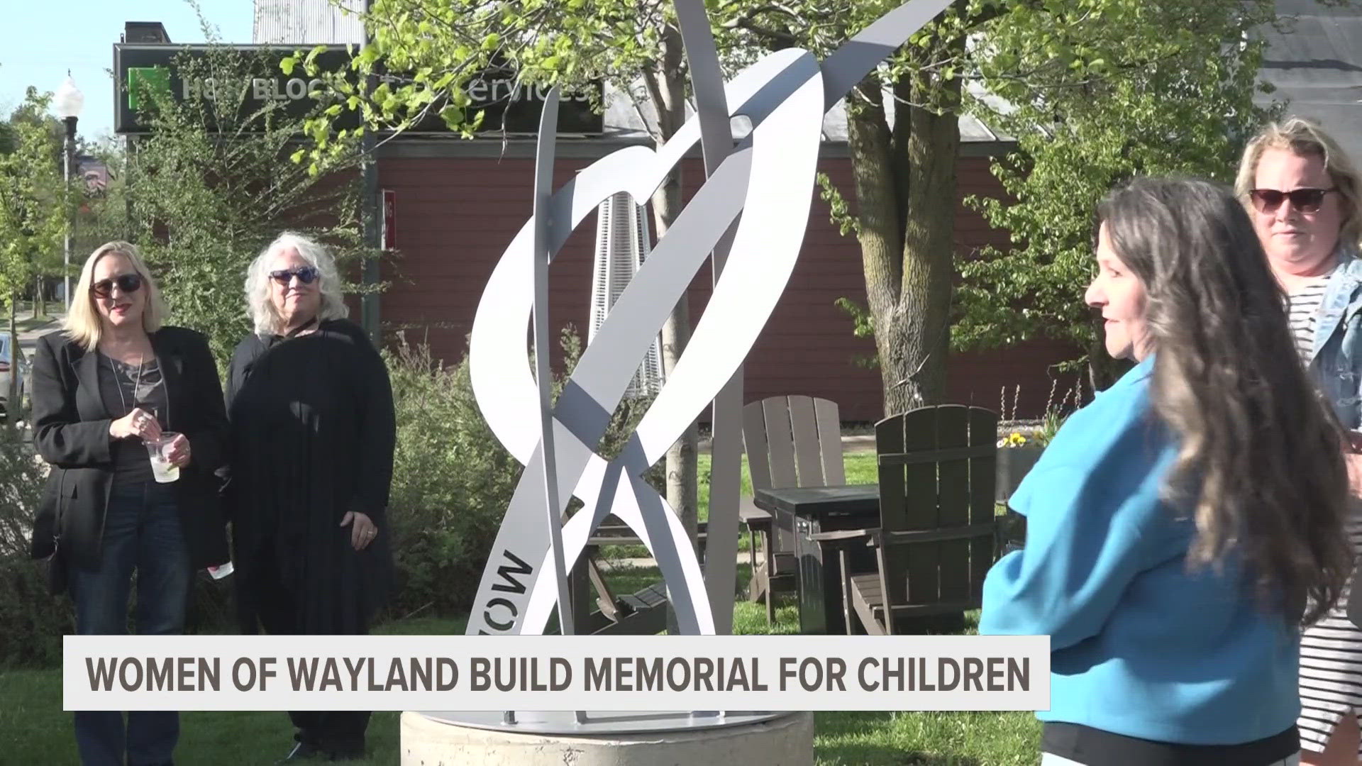 Women of Wayland dedicate memorial sculpture for deceased children.