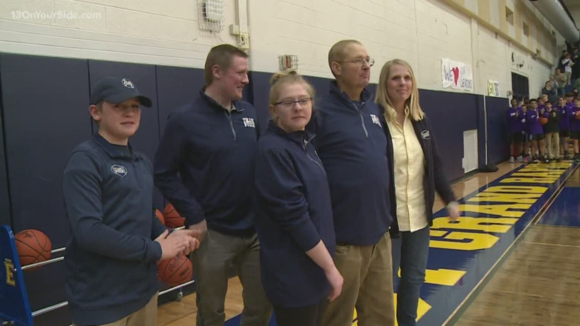 Forest Hills Northern and East Grand Rapids put their rivalry aside for a good cause. The two schools came together to raise money for man suffering from cancer.