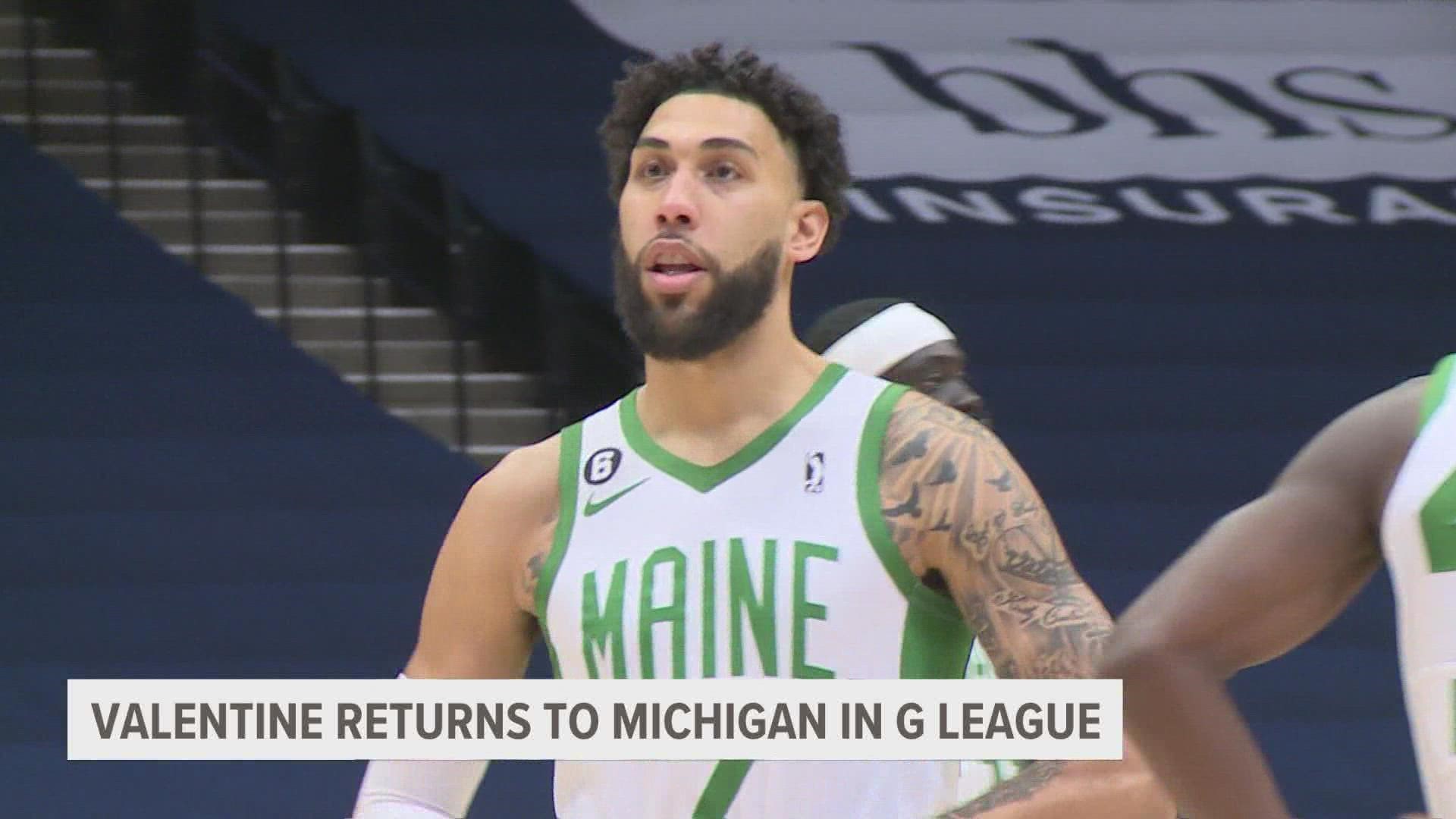 Denzel Valentine of the Maine Celtics shoots the ball against the