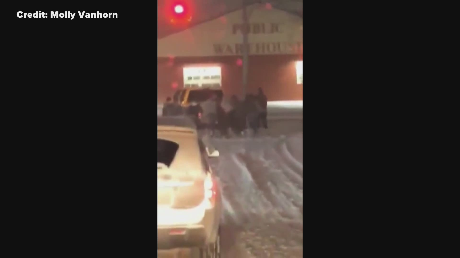 The Greenville High School wrestling team helped push a stuck car out of the snow at 5:30 a.m. Saturday morning.