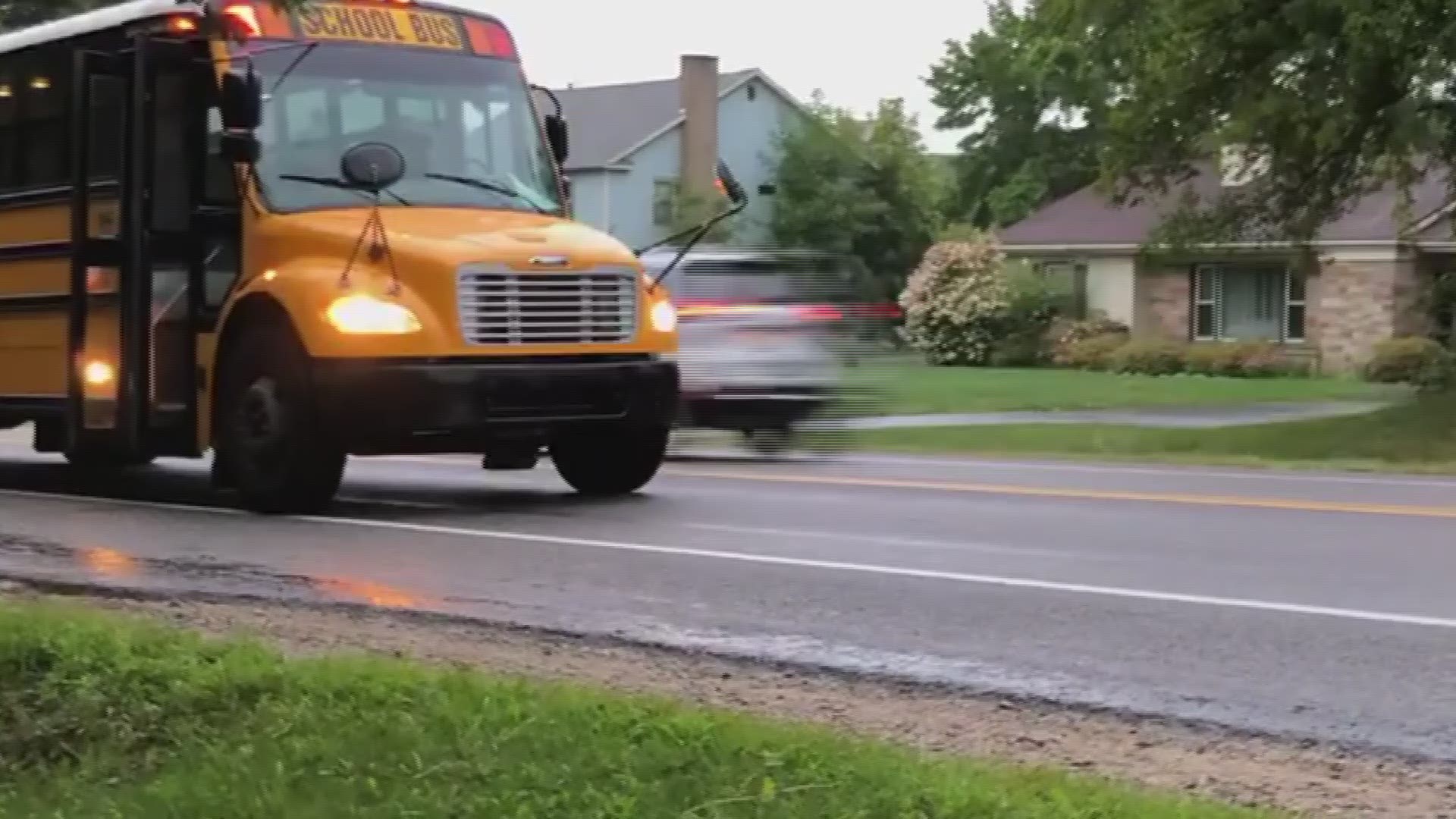 Parents fed up with drivers speeding past school bus stop.