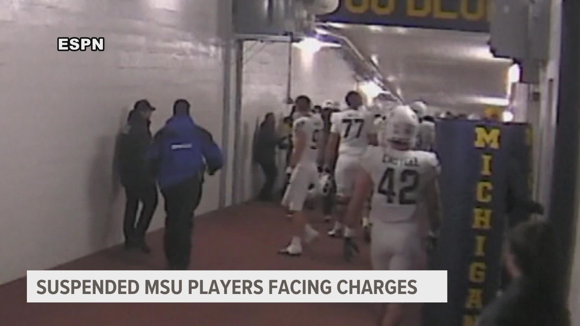 Nearly a month after a tunnel brawl following the Michigan State University and University of Michigan rivalry game, seven MSU players are facing charges.