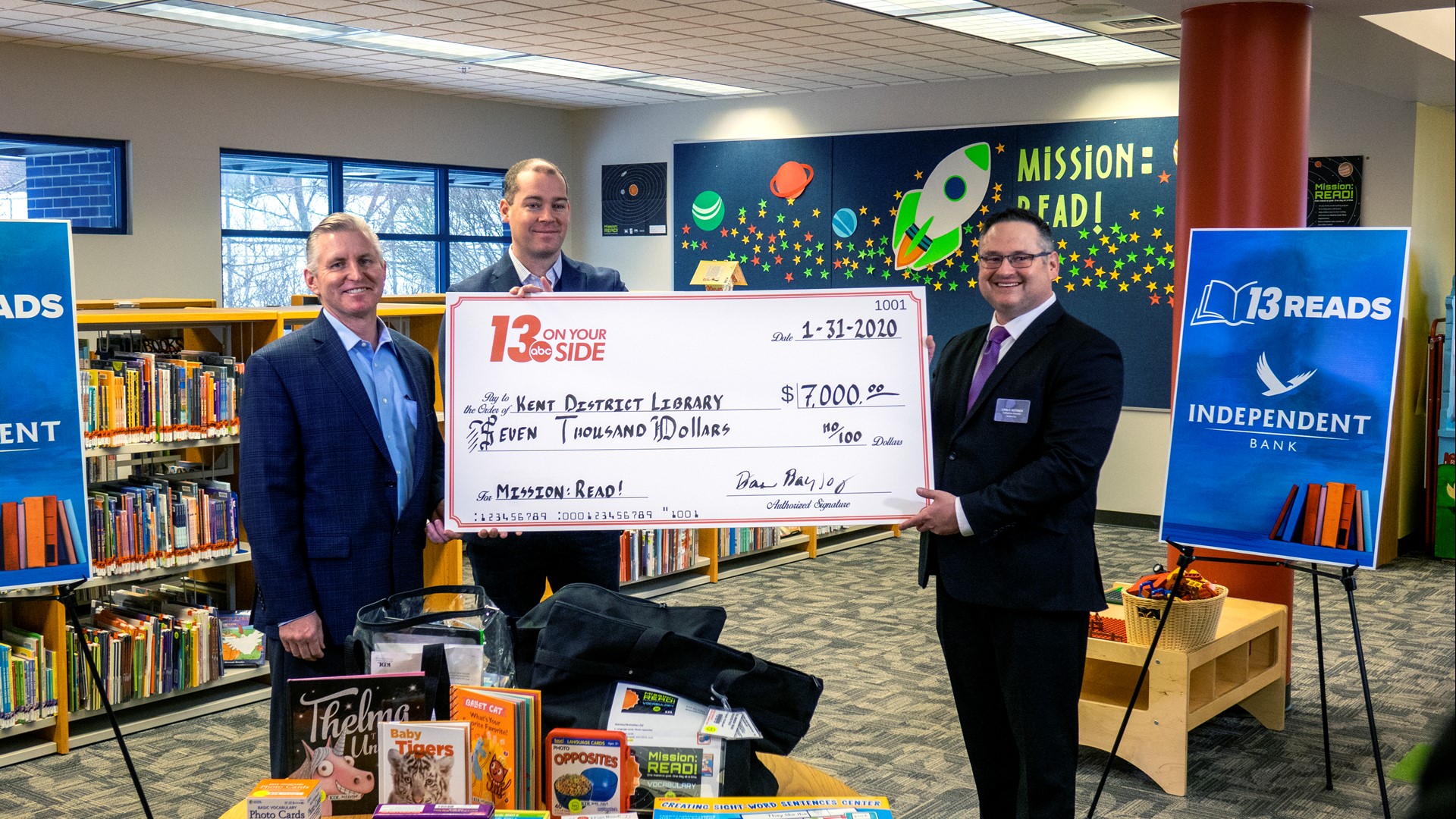 13 ON YOUR SIDE and Independent Bank have come together to present the Kent District Library with funds that will improve community literacy.