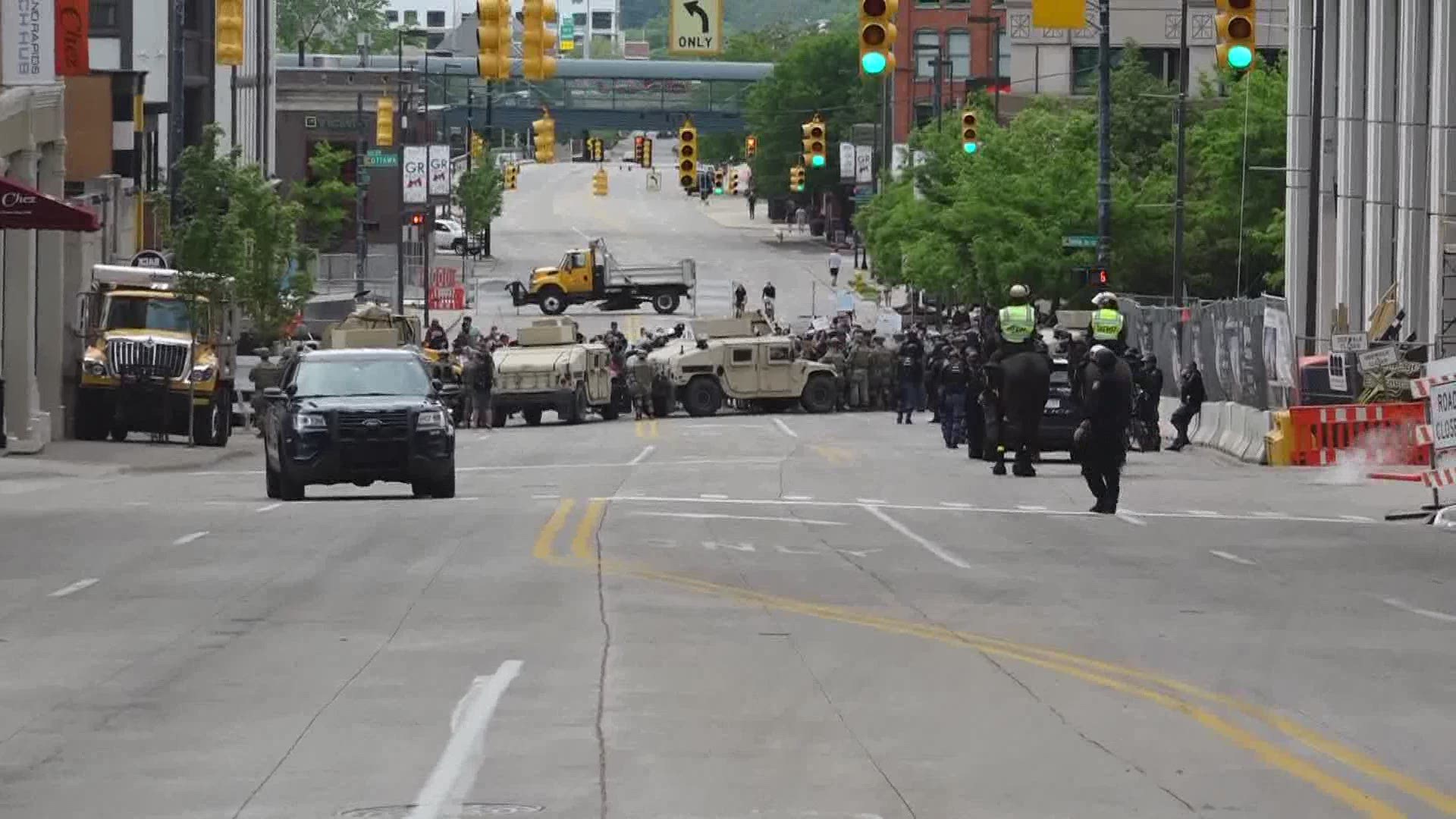 A protest in Grand Rapids came to a sudden end when police enforced a 7 p.m. curfew.