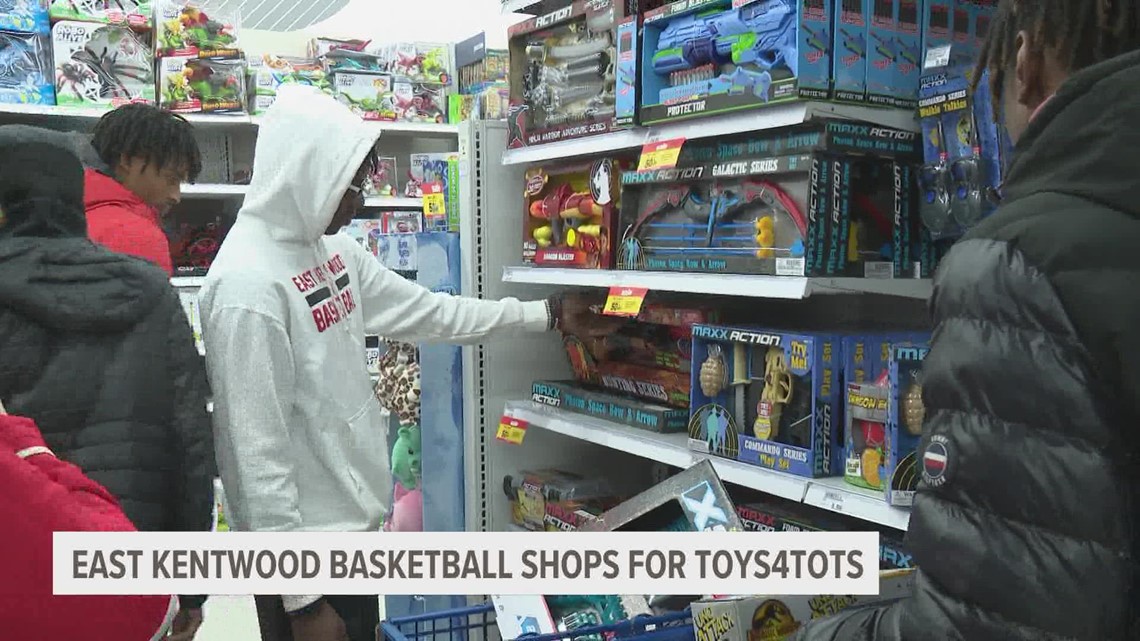 'It's about the kids': East Kentwood HS basketball team shops for Toys for Tots with raised funds