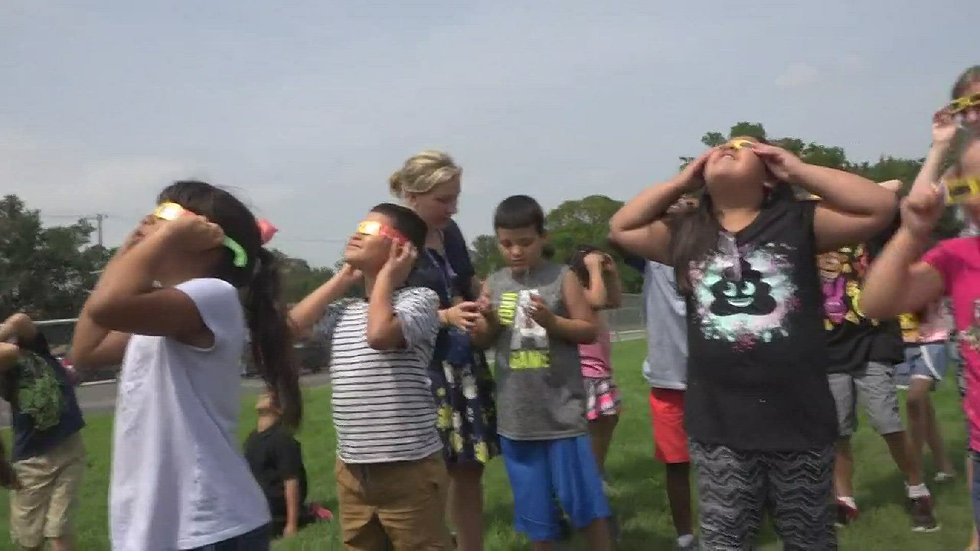 Students watch the eclipse in awe